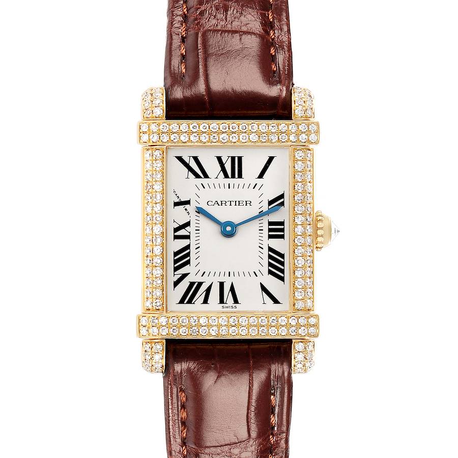 The Cartier Tank Louis 2305 Women's Yellow Gold Silver Dial watch is shown from a top-down angle, highlighting its rectangular face, Roman numerals, gold case, diamonds, and brown leather strap.
