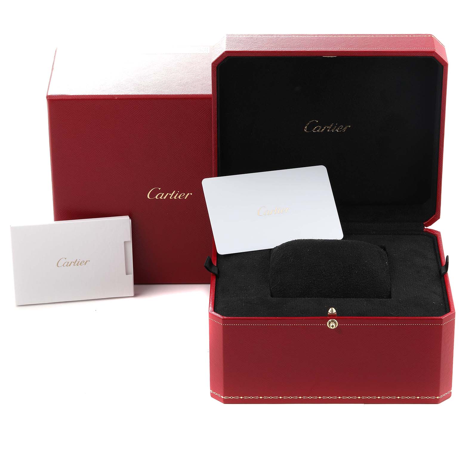 This image shows the packaging and accessories for the Cartier Tank Must WSTA0052 Women's Stainless Steel Silver Dial WSTA0052 Women's Stainless Steel Silver Dial model, including a red box, card, and cushion.