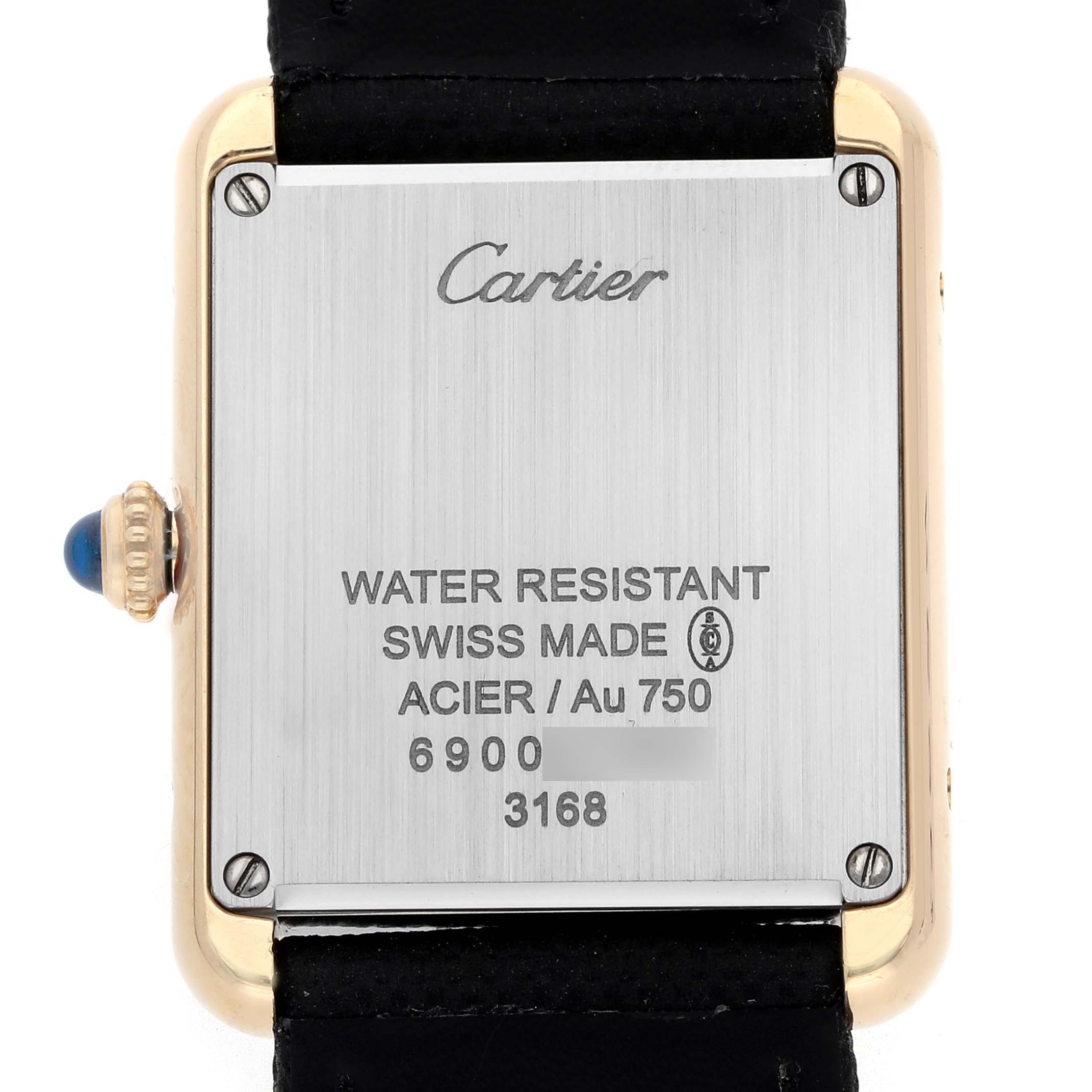 The image shows the back case of the Cartier Tank Solo W5200002 Women
s Steel and Gold (two tone) Silver Dial, featuring brand details and specifications.