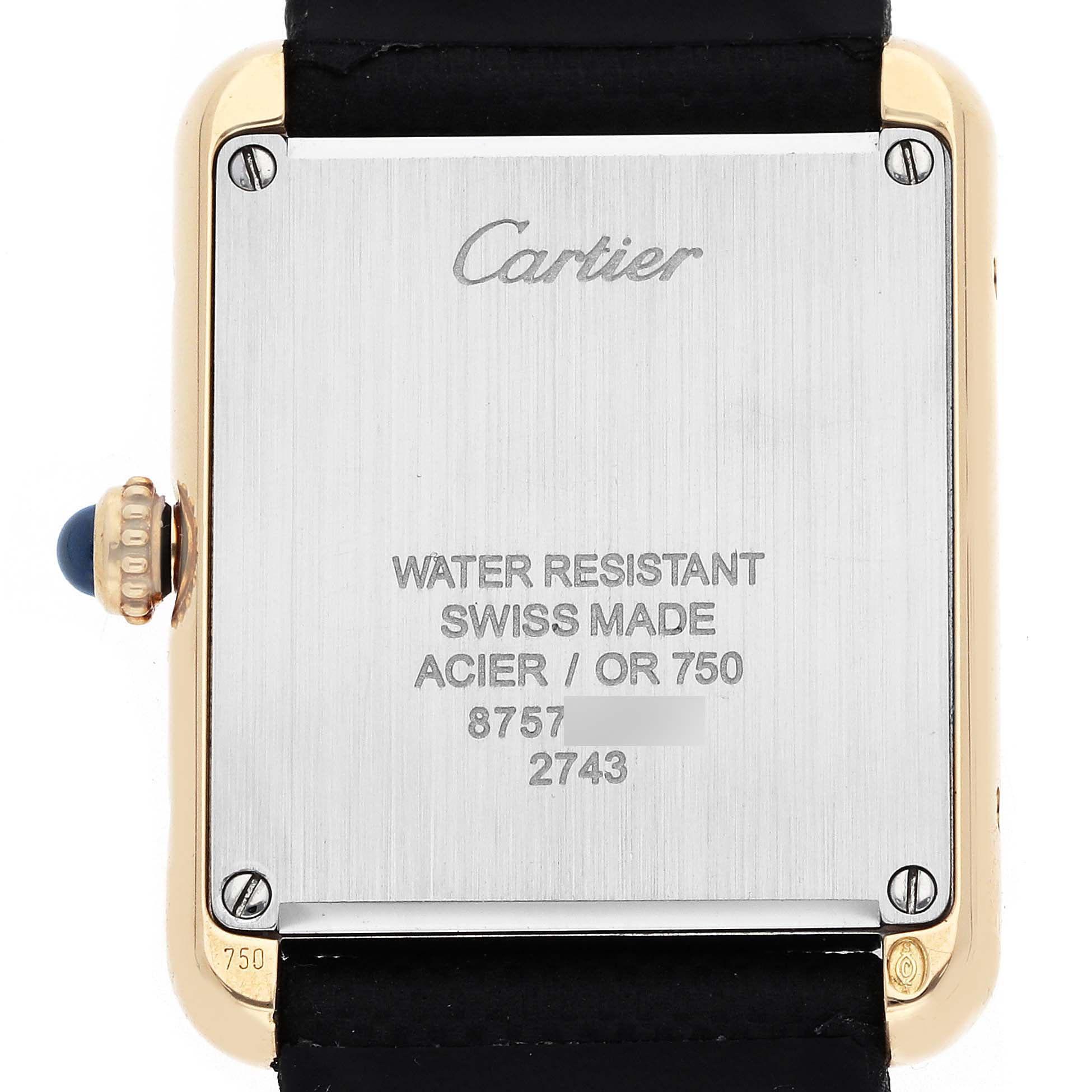 The image shows the back of the Cartier Tank Solo W5200002 Women
s Steel and Gold (two tone) Silver Dial watch, displaying the brand name, model details, and the crown with a blue cabochon.