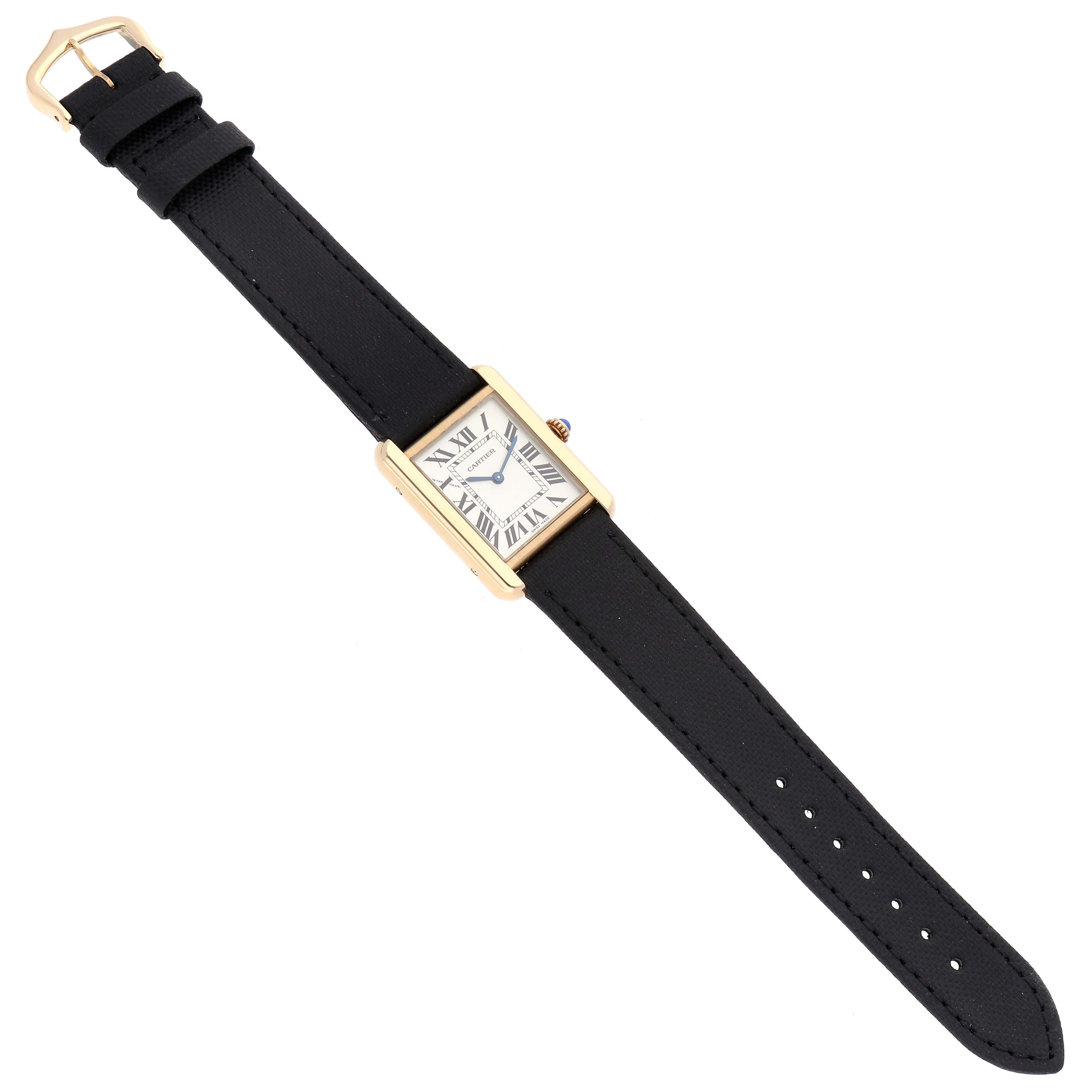 The Cartier Tank Solo W5200002 Women
s Steel and Gold (two tone) Silver Dial watch is shown from an overhead view, displaying its rectangular face, black strap, and gold buckle.
