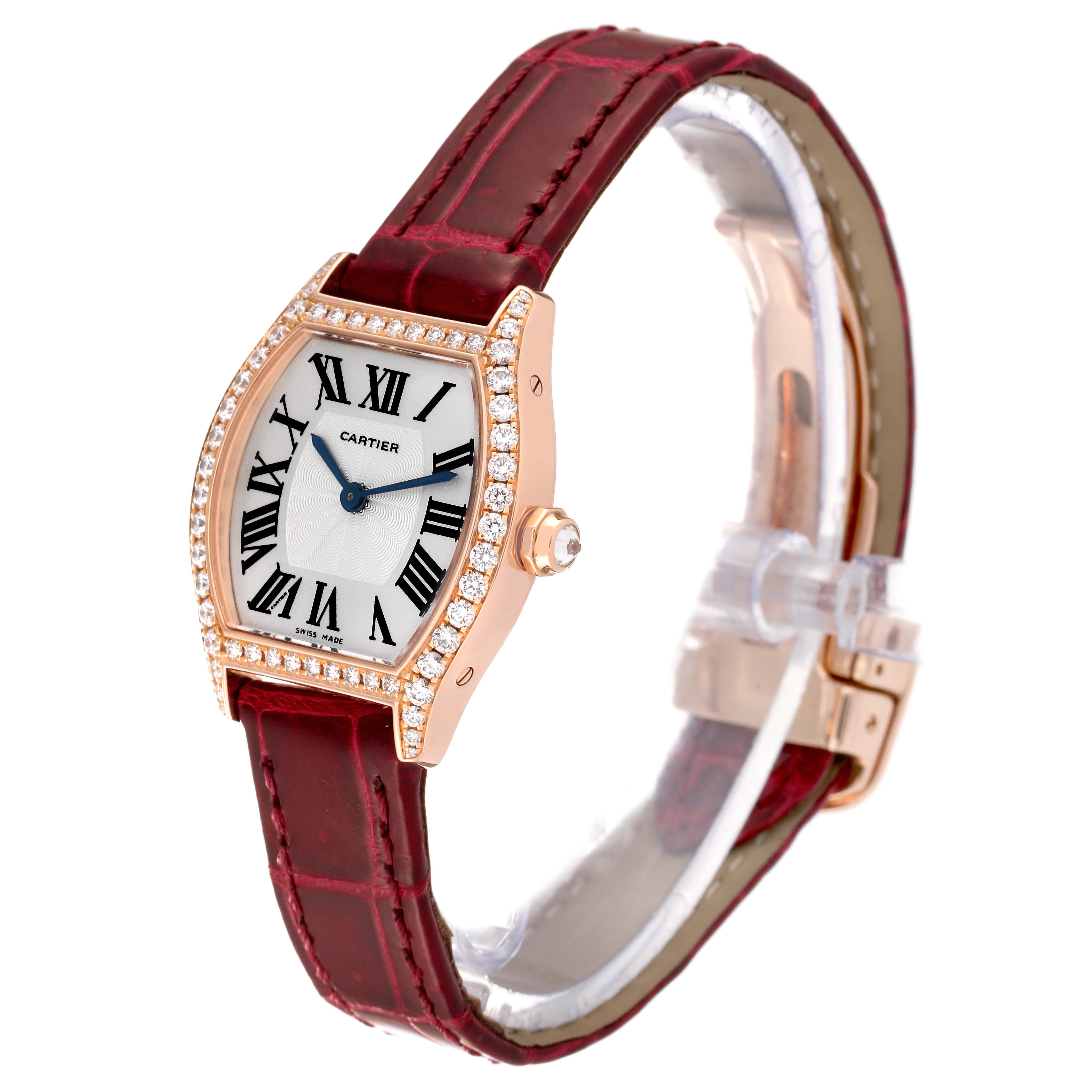 The Cartier Tortue WA501006 Women
s Rose Gold Silver Dial WA501006 Women
s Rose Gold Silver Dial watch is shown at a slight angle, displaying its face, bezel, crown, and strap.