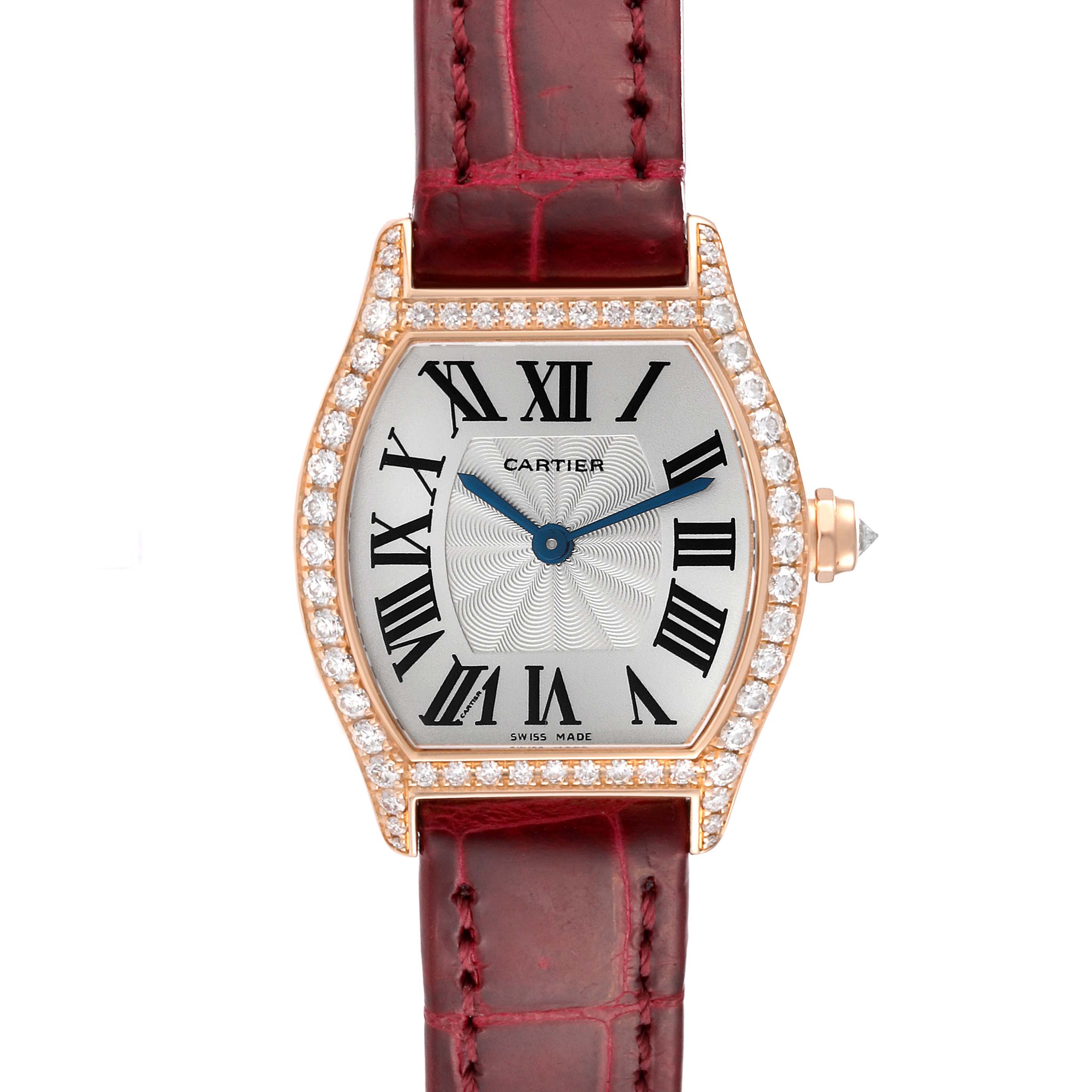 This image shows a frontal view of a Cartier Tortue WA501006 Women
s Rose Gold Silver Dial WA501006 Women
s Rose Gold Silver Dial watch featuring a diamond bezel and a red leather strap.