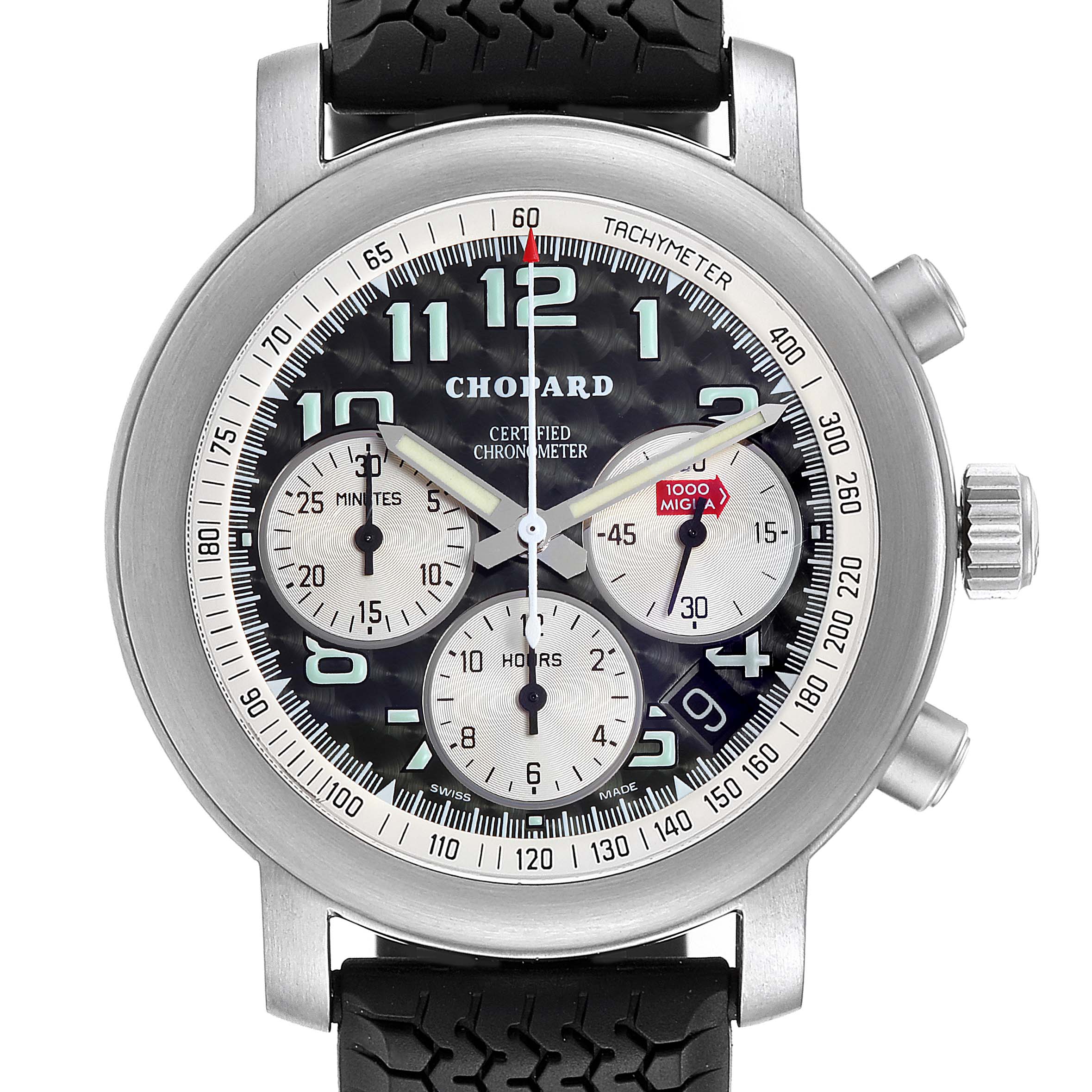 The image shows a Mille Miglia model by Chopard, featuring a stainless steel case, tachymeter bezel, and black rubber strap.