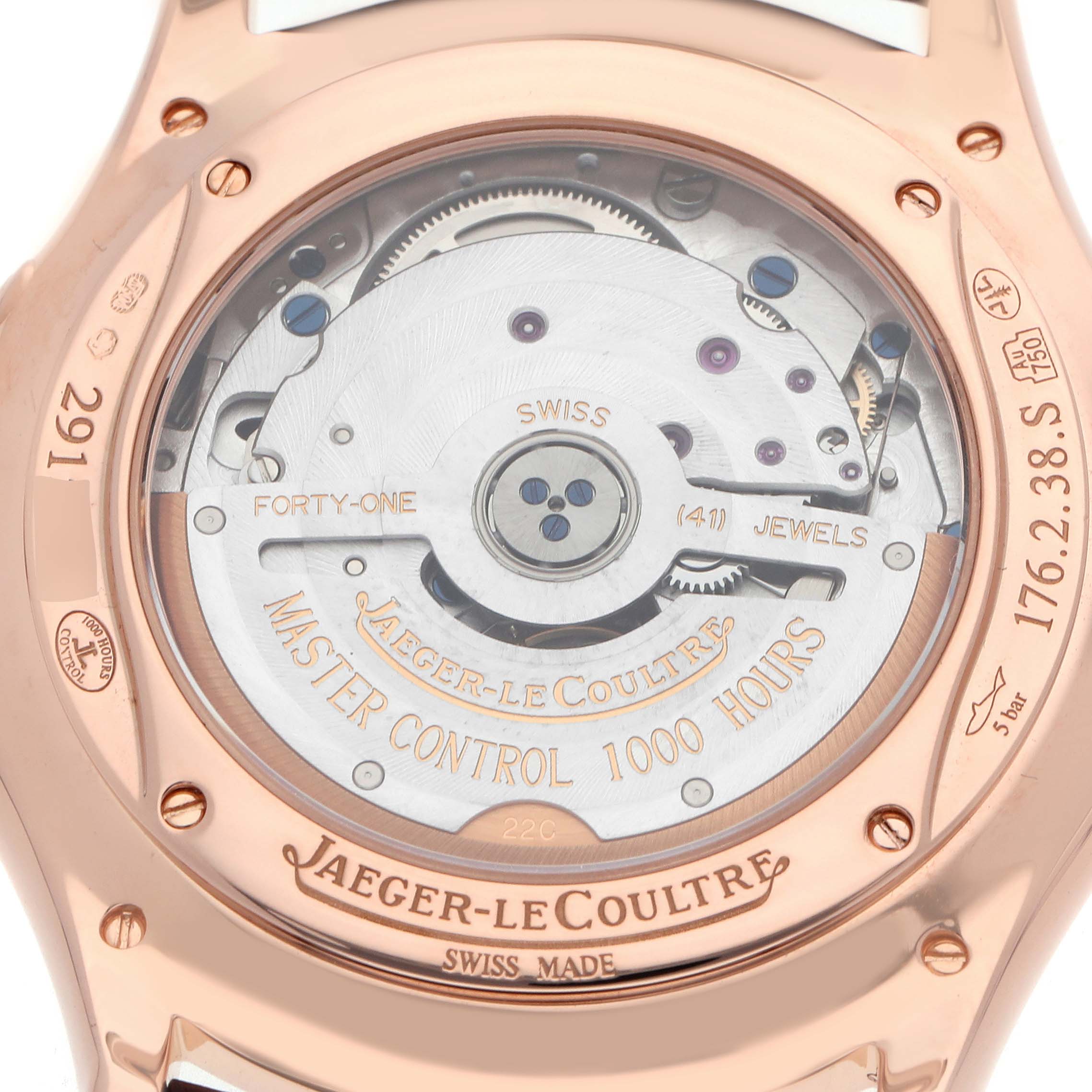 The image shows the back view of a Jaeger-LeCoultre Master watch, highlighting the movement and engravings.