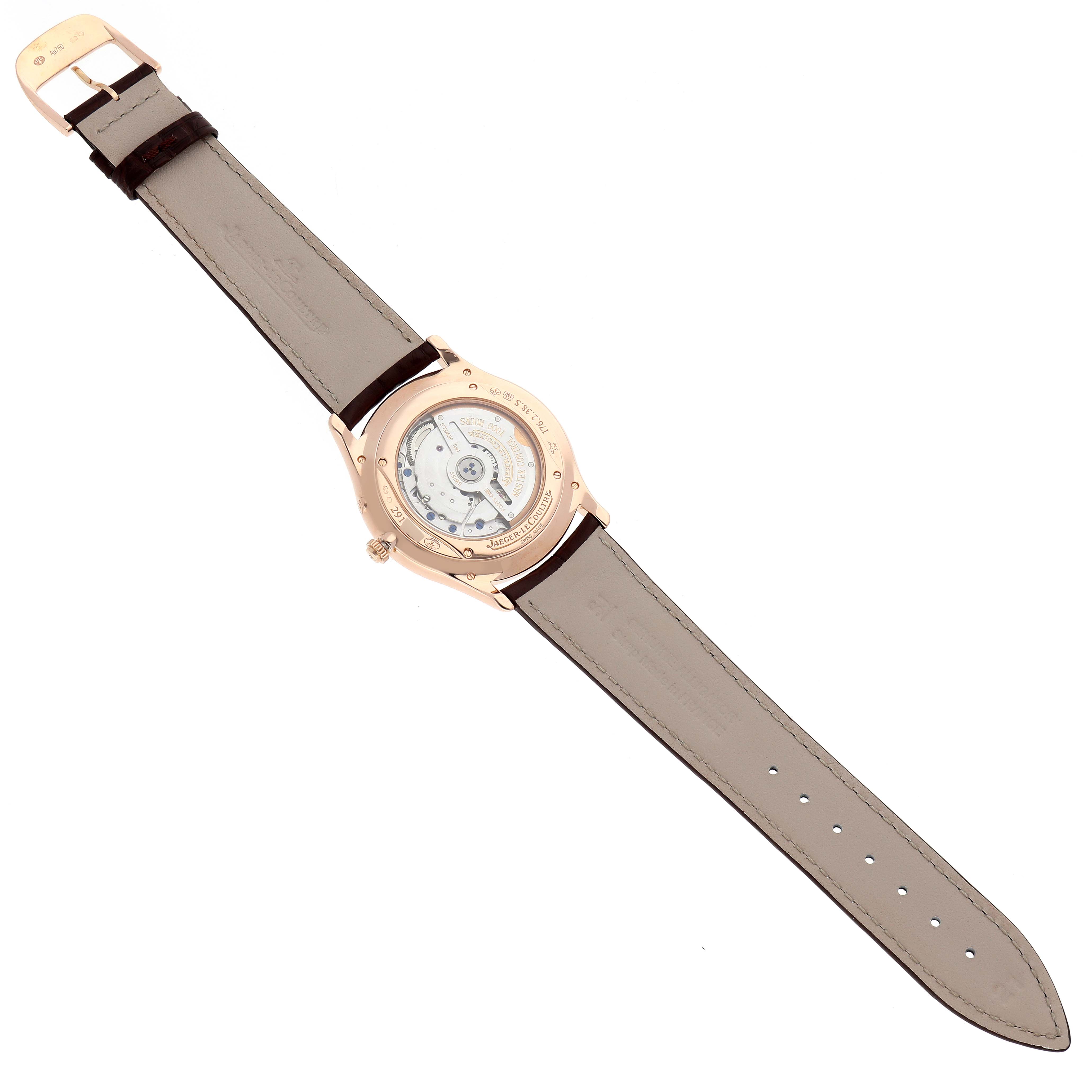 The Jaeger-LeCoultre Master watch is shown from the back, highlighting its open case back and strap.