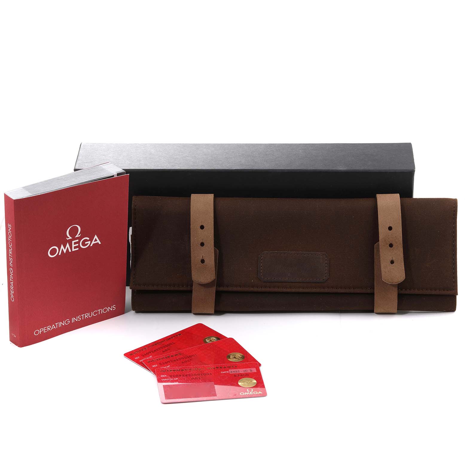 The image shows the operating instructions, a brown watch roll, and warranty cards for the Omega Seamaster 210.92.42.20.01.001 Men's Titanium Brown Dial 210.92.42.20.01.001 Men's Titanium Brown Dial model.