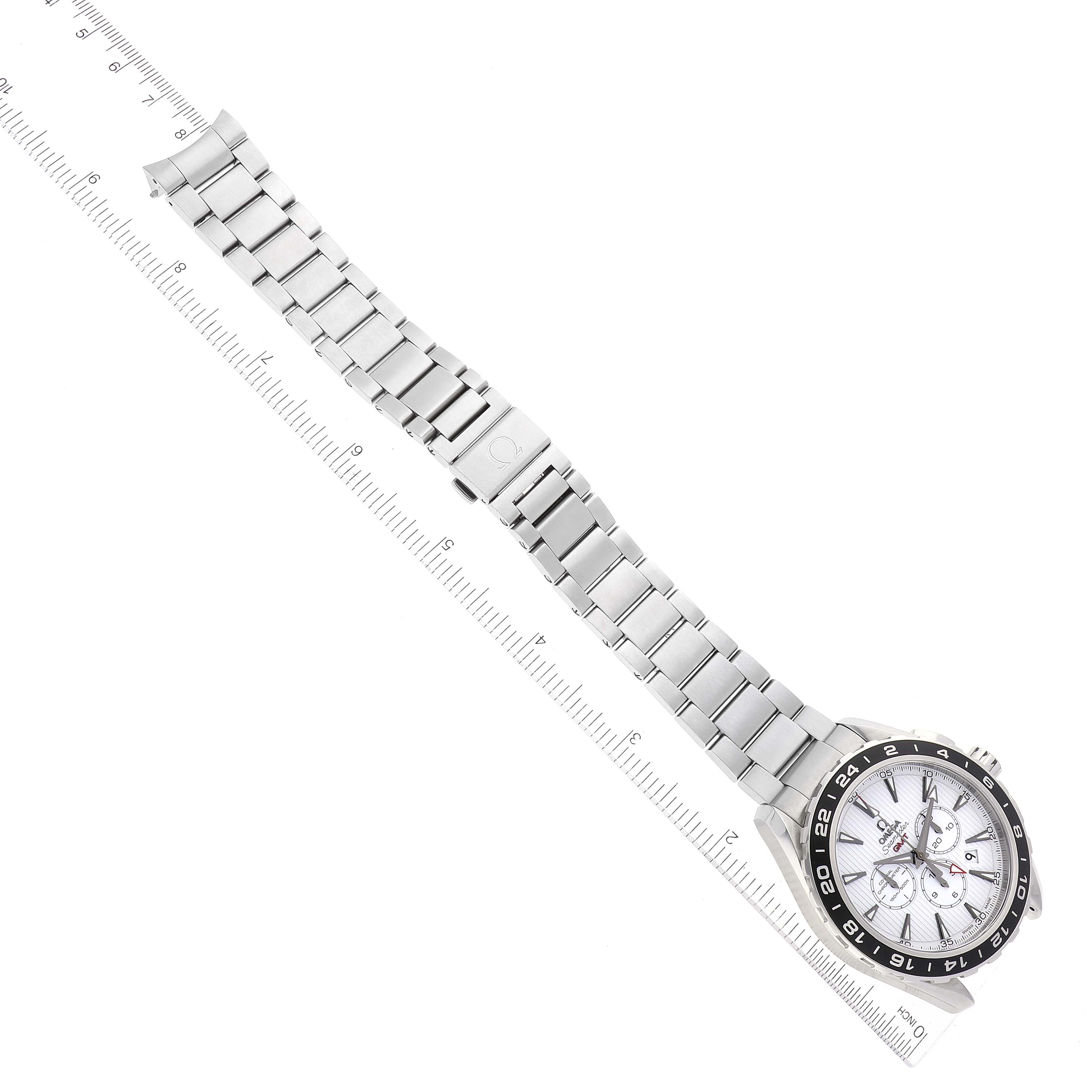 The image shows an Omega Seamaster 231.10.44.52.04.001 Men's Stainless Steel White Dial 231.10.44.52.04.001 Men's Stainless Steel White Dial watch lying flat, displaying its full metal bracelet and a partial ruler for scale.
