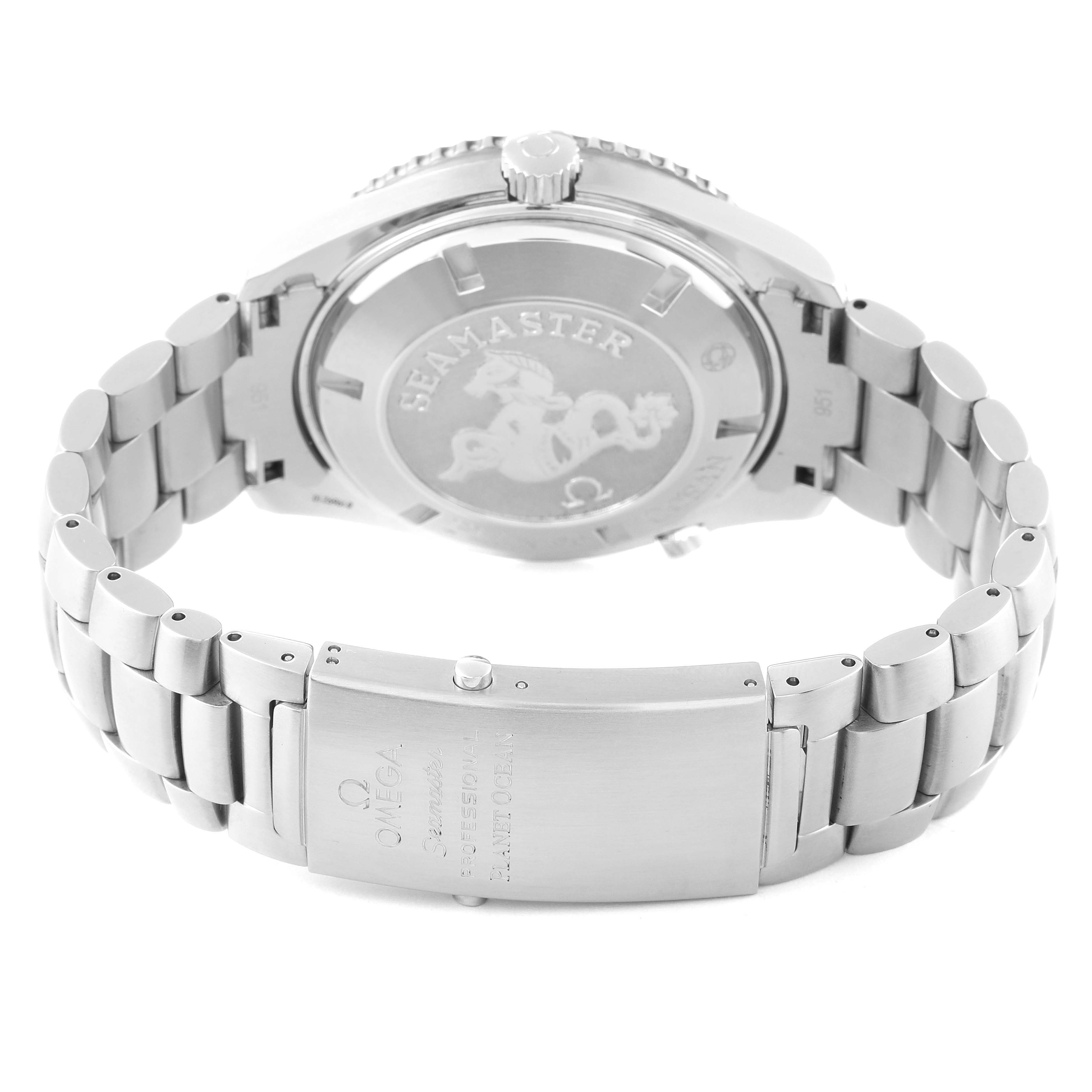 The image shows the back side of an Omega Seamaster Planet Ocean watch, highlighting the bracelet and clasp.