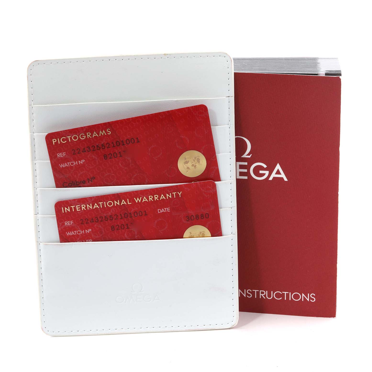 This image shows warranty cards in a white holder and an instruction booklet for the Omega Ploprof 224.32.55.21.01.002 Men
s Stainless Steel Black Dial 224.32.55.21.01.002 Men
s Stainless Steel Black Dial watch.