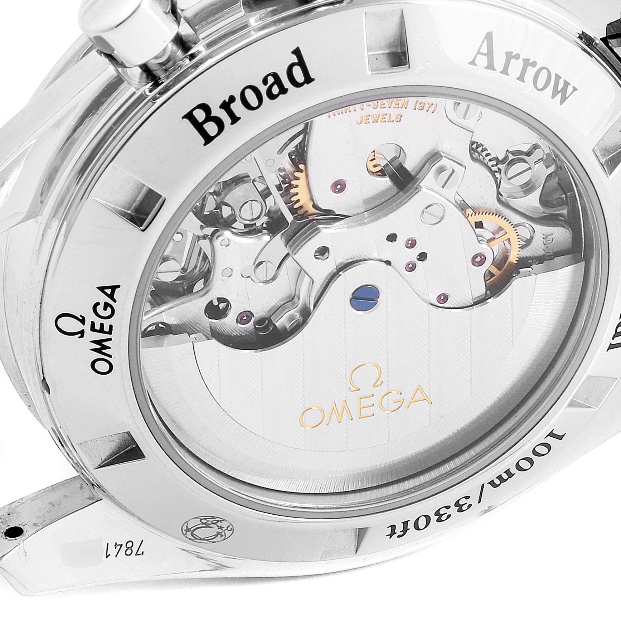 The image shows the back case of an Omega Speedmaster 321.10.42.50.01.001 Men's Stainless Steel Black Dial 321.10.42.50.01.001 Men's Stainless Steel Black Dial "Broad Arrow" model, highlighting its internal mechanism.