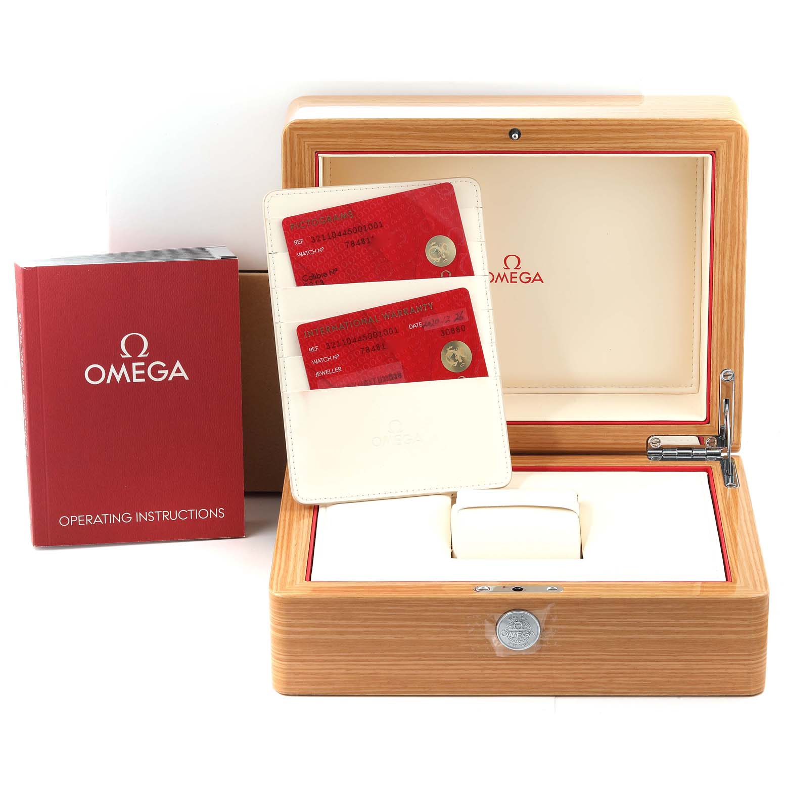 This image shows the Omega Speedmaster 321.10.44.50.01.001 Men's Stainless Steel Black Dial 321.10.44.50.01.001 Men's Stainless Steel Black Dial watch packaging, including a wooden box, warranty cards, and an instruction manual.