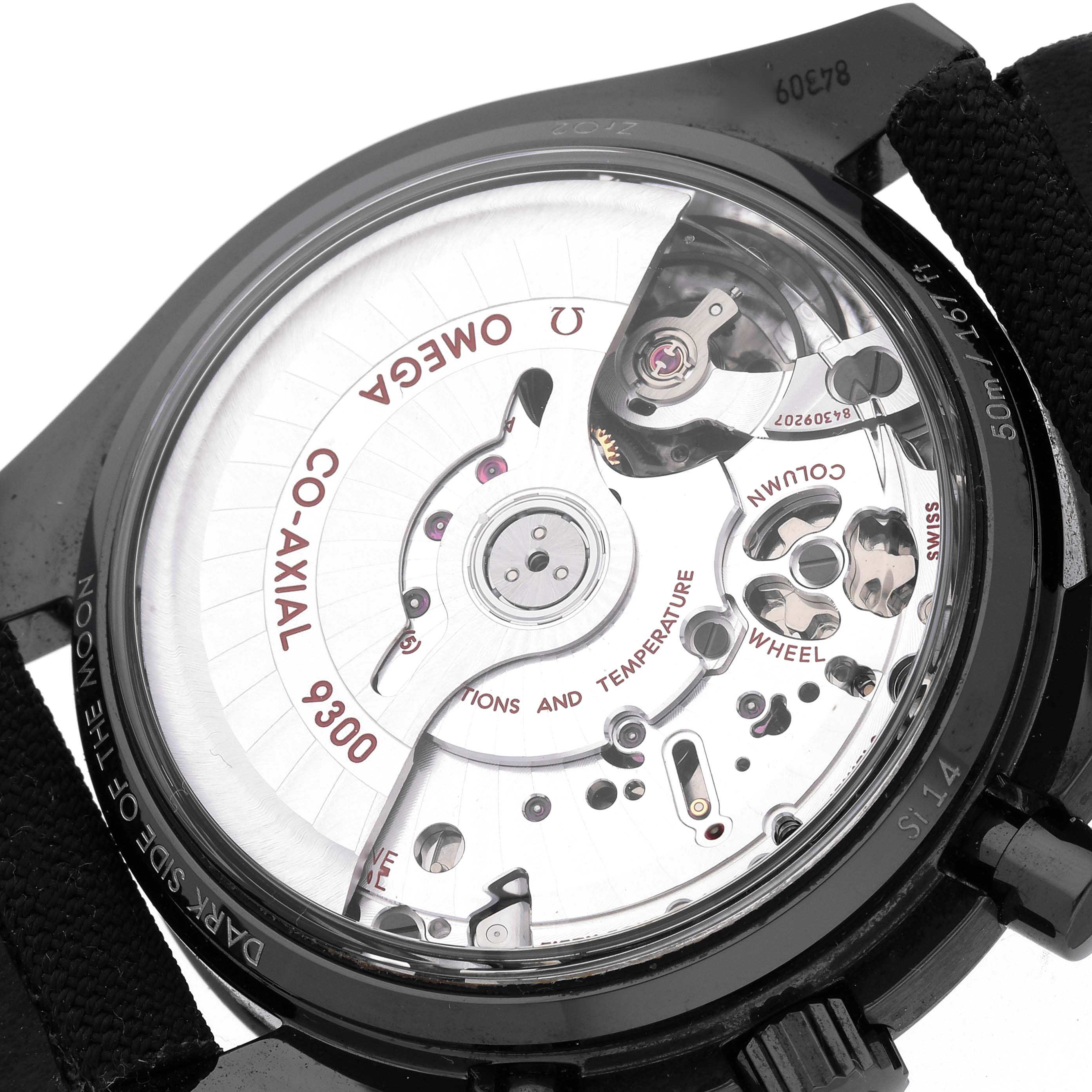 The image shows the back view of the Omega Speedmaster 311.92.44.51.01.005 Men's Ceramic Black Dial 311.92.44.51.01.005 Men's Ceramic Black Dial, revealing the Co-Axial 9300 movement and internal mechanisms.