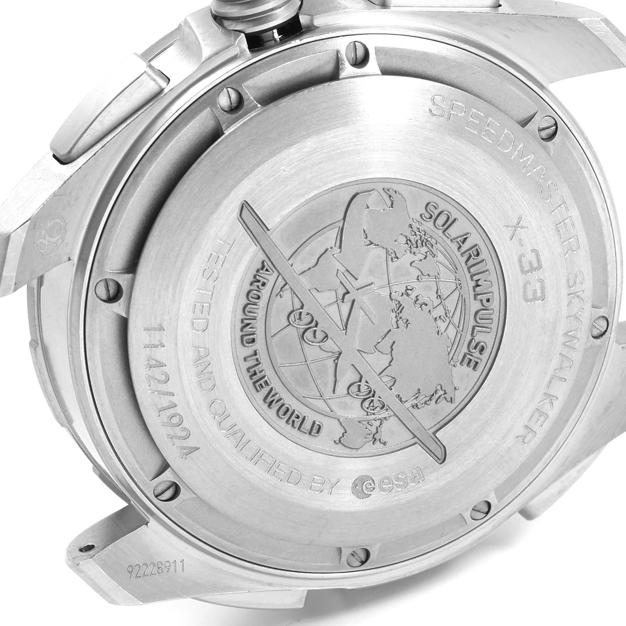 The image shows the case back of the Omega Speedmaster 318.92.45.79.03.001 Men's Platinum Blue Dial 318.92.45.79.03.001 Men's Platinum Blue Dial Skywalker X-33 watch, highlighting the engraved details.