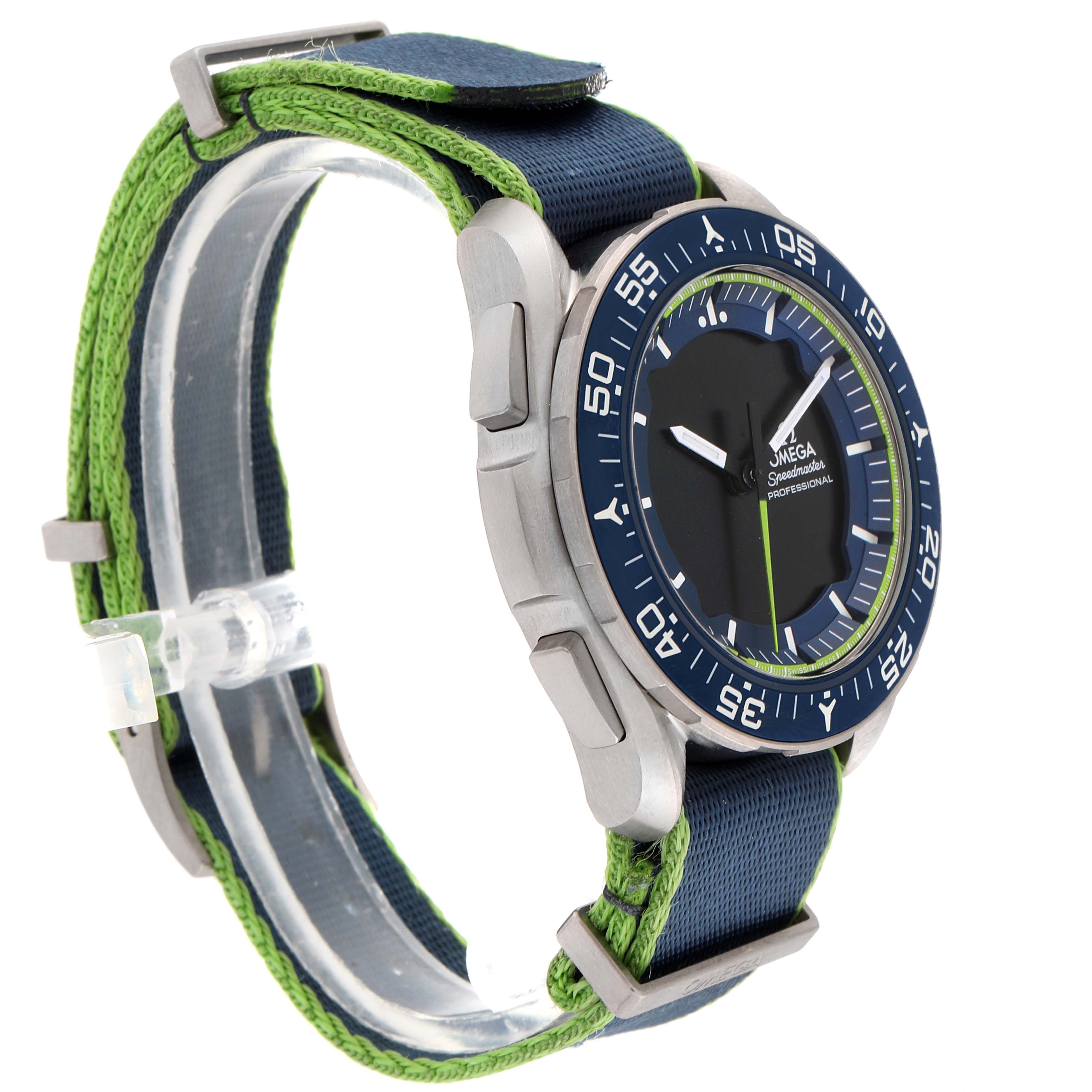 The image shows an Omega Speedmaster 318.92.45.79.03.001 Men's Platinum Blue Dial 318.92.45.79.03.001 Men's Platinum Blue Dial watch with a side view angle, featuring its case, bezel, dial, and strap.