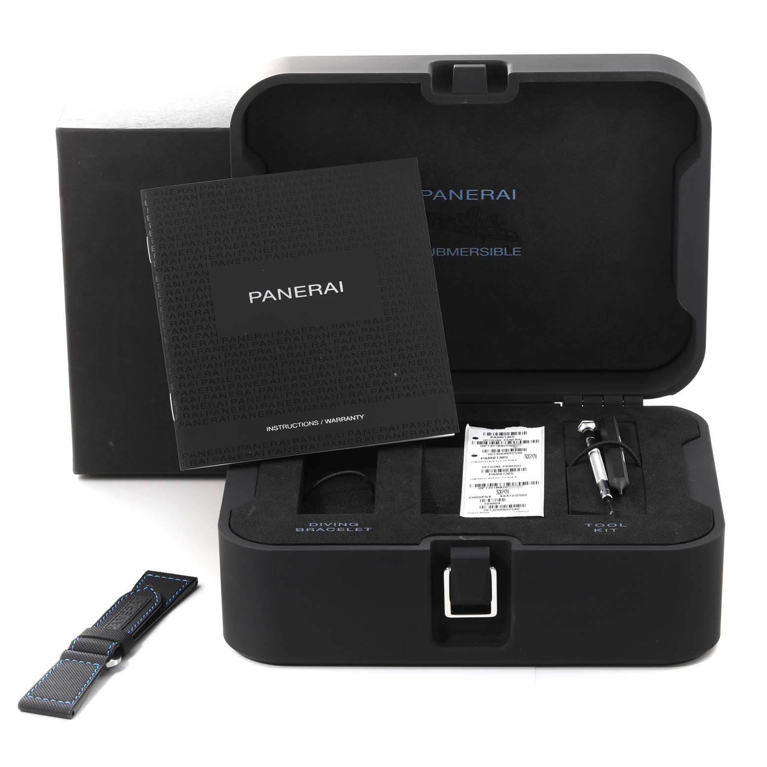 The image shows a Panerai Submersible PAM01305 Men's Titanium Black Dial PAM01305 Men's Titanium Black Dial watch box containing instructions, a diving bracelet, and a tool kit from a top-down angle.