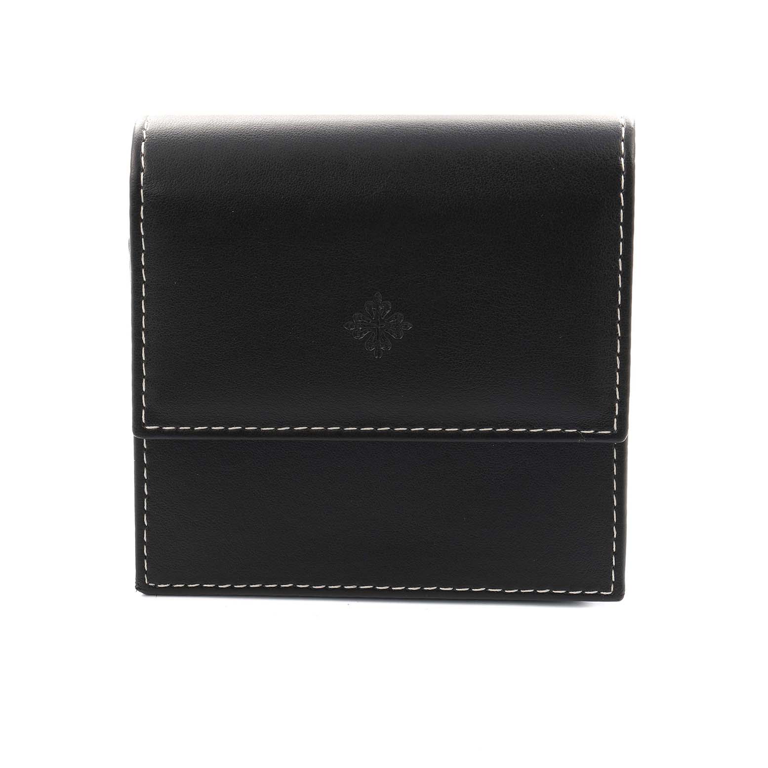 The image shows a black leather case for a Patek Philippe Aquanaut 5066J Men
s Yellow Gold Black Dial watch, featuring white stitching and a logo on the front.