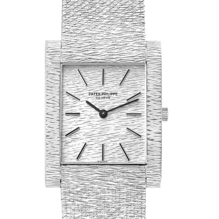 The image shows a front view of a Vintage Patek Philippe watch, highlighting its textured dial, rectangular case, and crown.