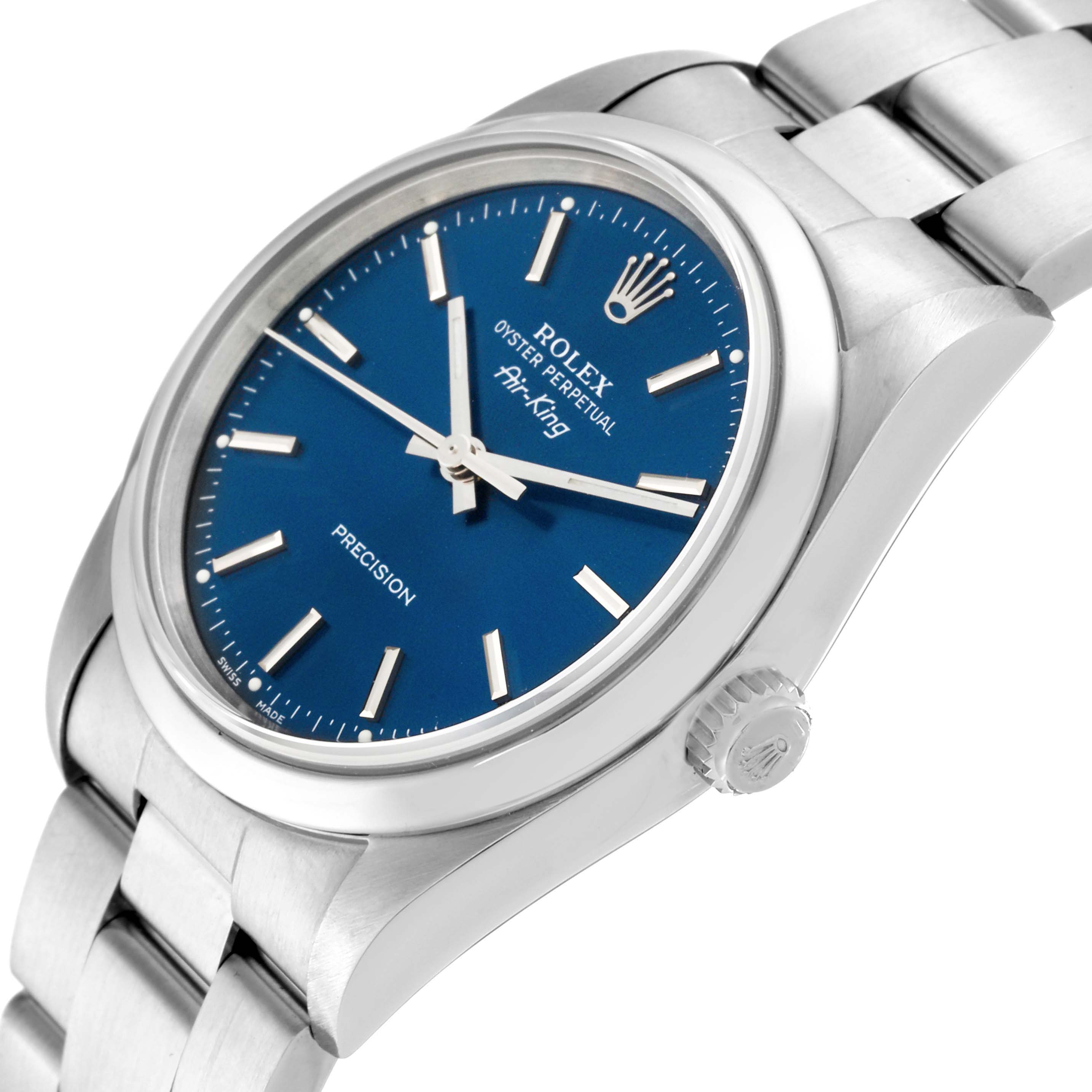 The image shows a side view of the Rolex Air-King 14000 Men's Stainless Steel Blue Dial 14000 Men's Stainless Steel Blue Dial watch, highlighting the crown, blue dial, and stainless steel bracelet.