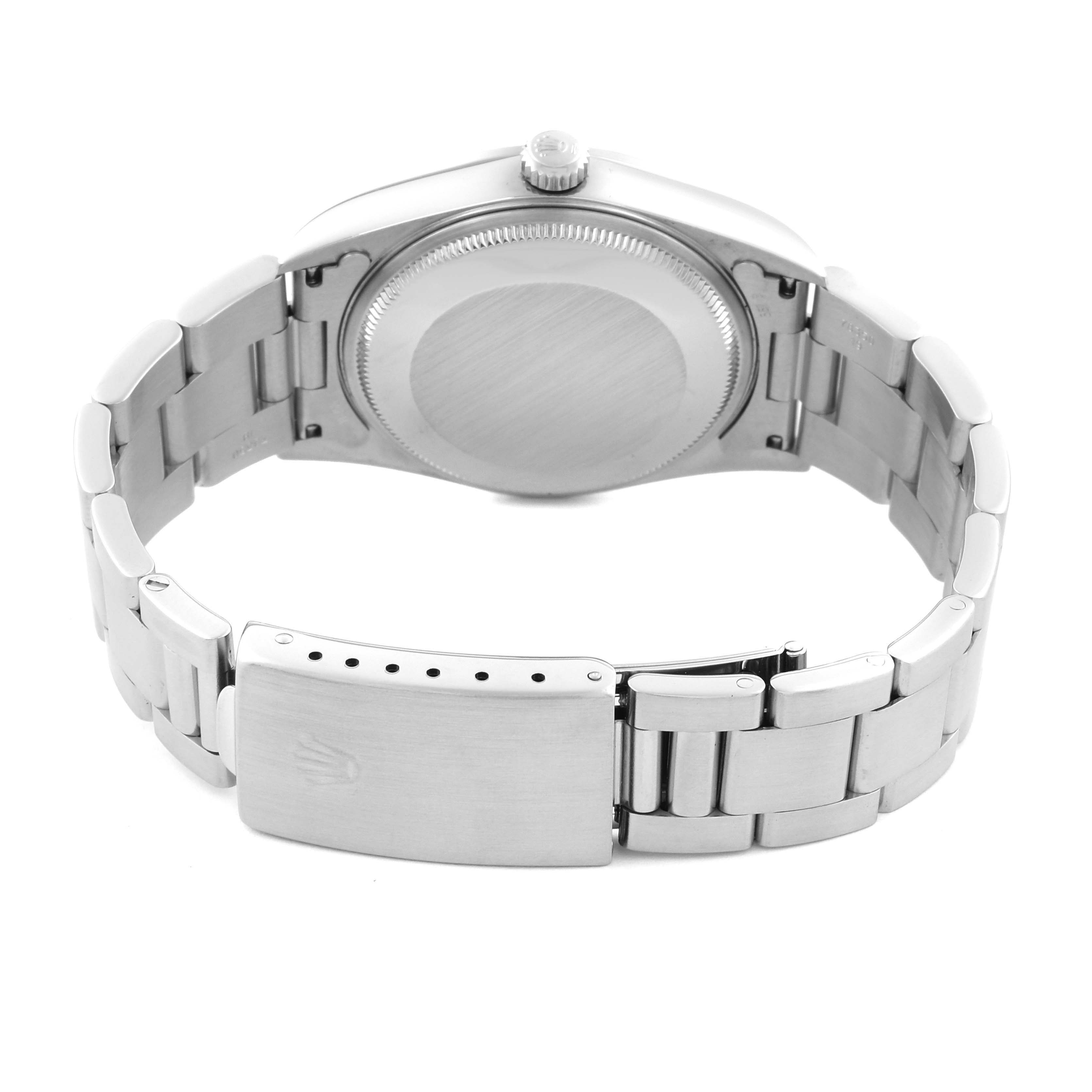 This image shows the back view of a Rolex Air-King 14000 Men's Stainless Steel Blue Dial 14000 Men's Stainless Steel Blue Dial watch, highlighting its stainless steel case and bracelet clasp.