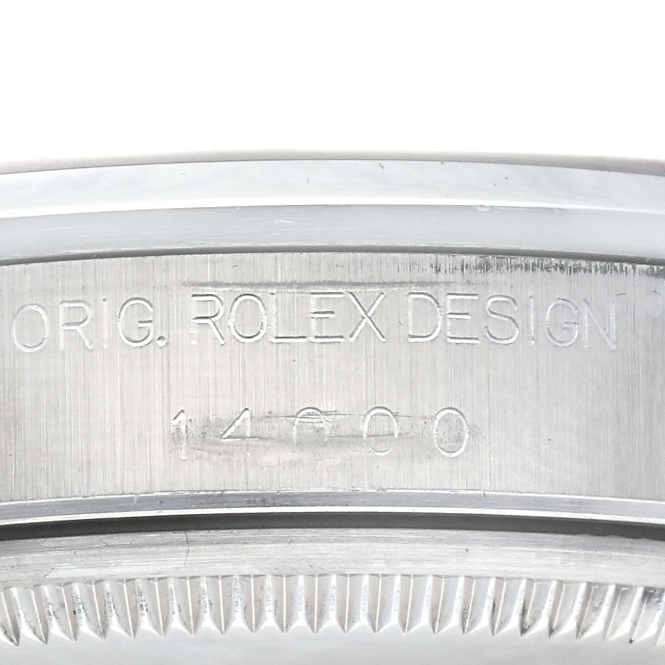 This close-up image shows the case back engraving of a Rolex Air-King 14000 Men's Stainless Steel Pink Dial 14000 Men's Stainless Steel Pink Dial model.