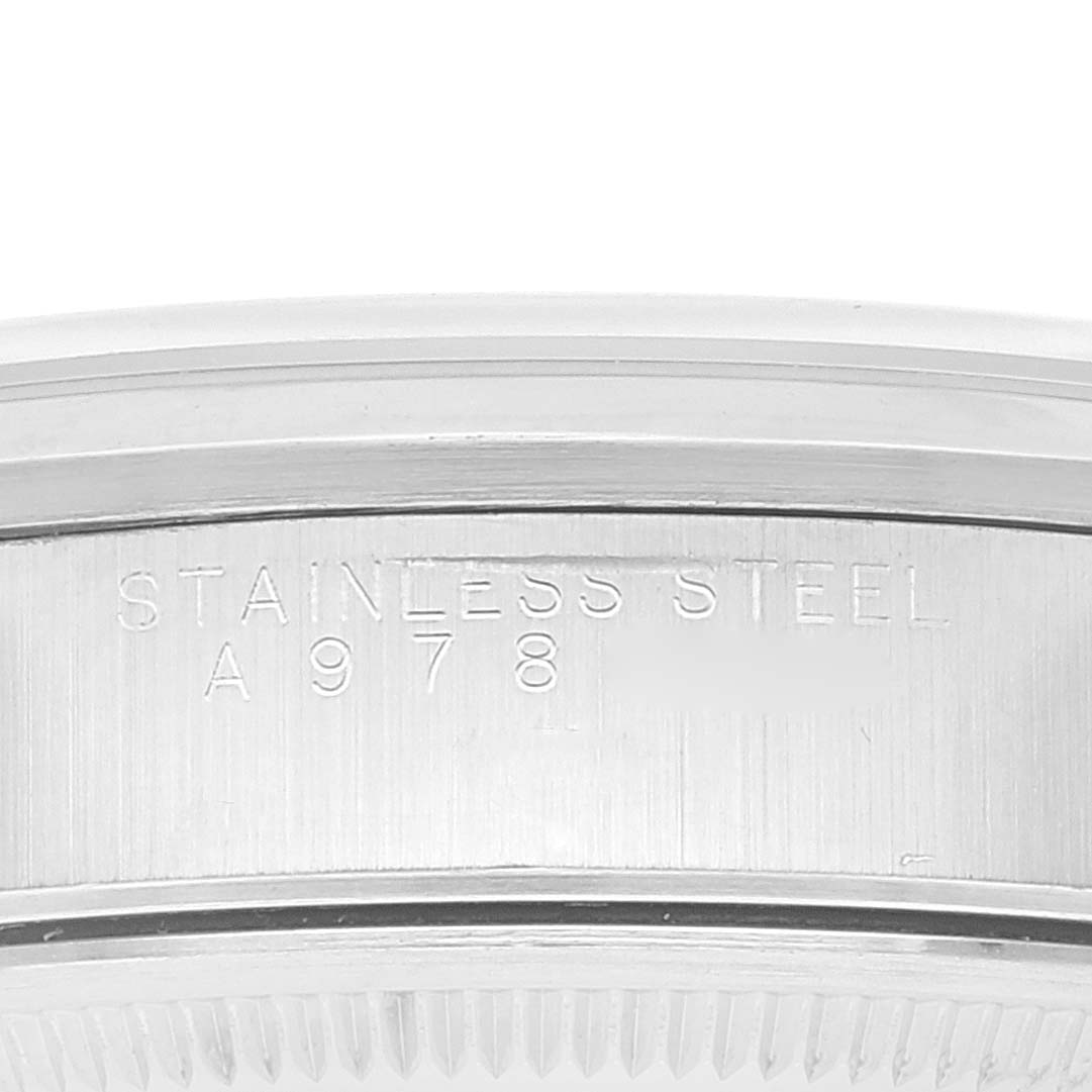 This close-up image shows the side engraving of the stainless steel casing of a Rolex Air-King 14000 Men's Stainless Steel Silver Dial 14000 Men's Stainless Steel Silver Dial watch.