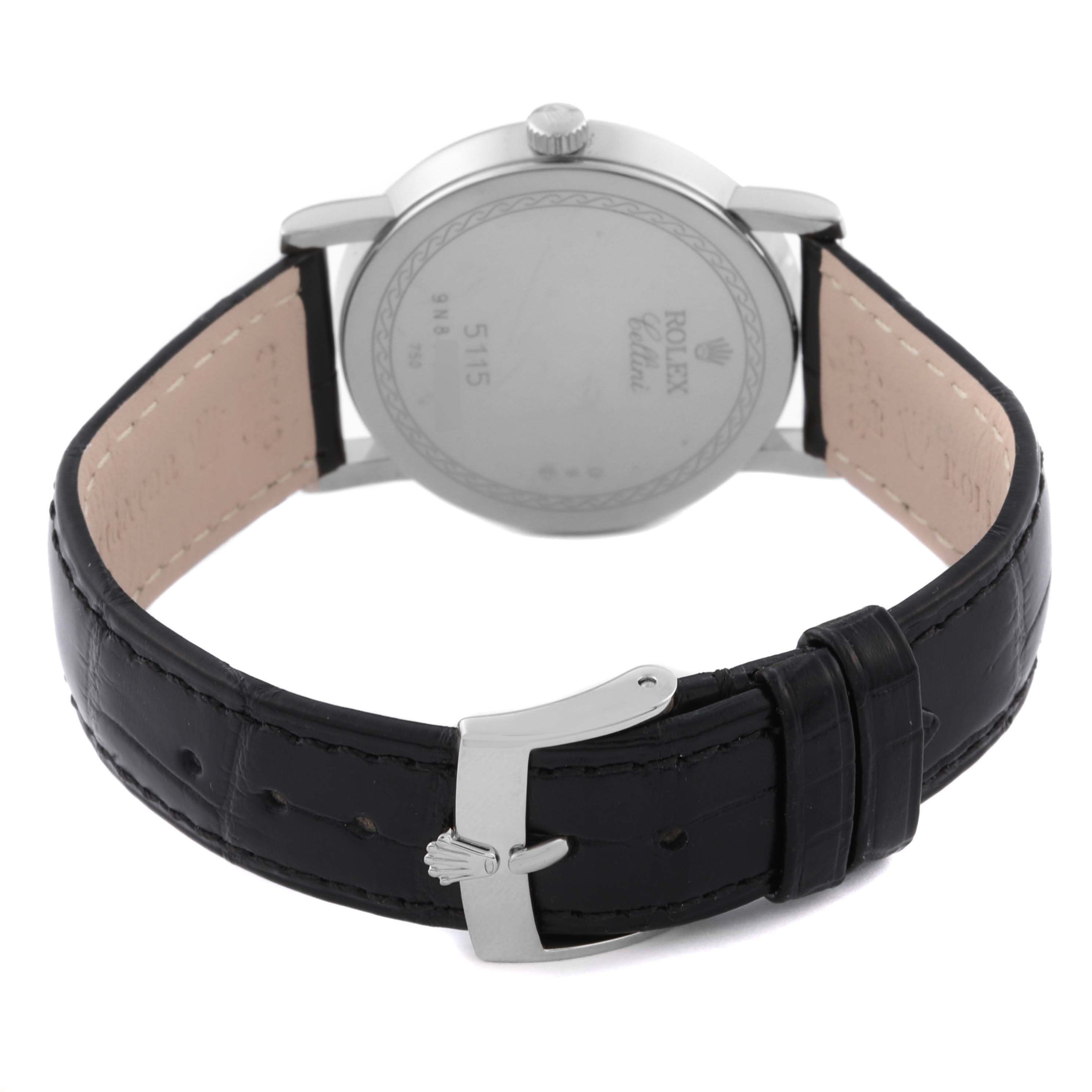The image shows the back view of the Rolex Cellini 5115/9 Men's White Gold White Dial 5115/9 Men's White Gold White Dial watch, highlighting the backplate and black leather strap with a silver buckle.