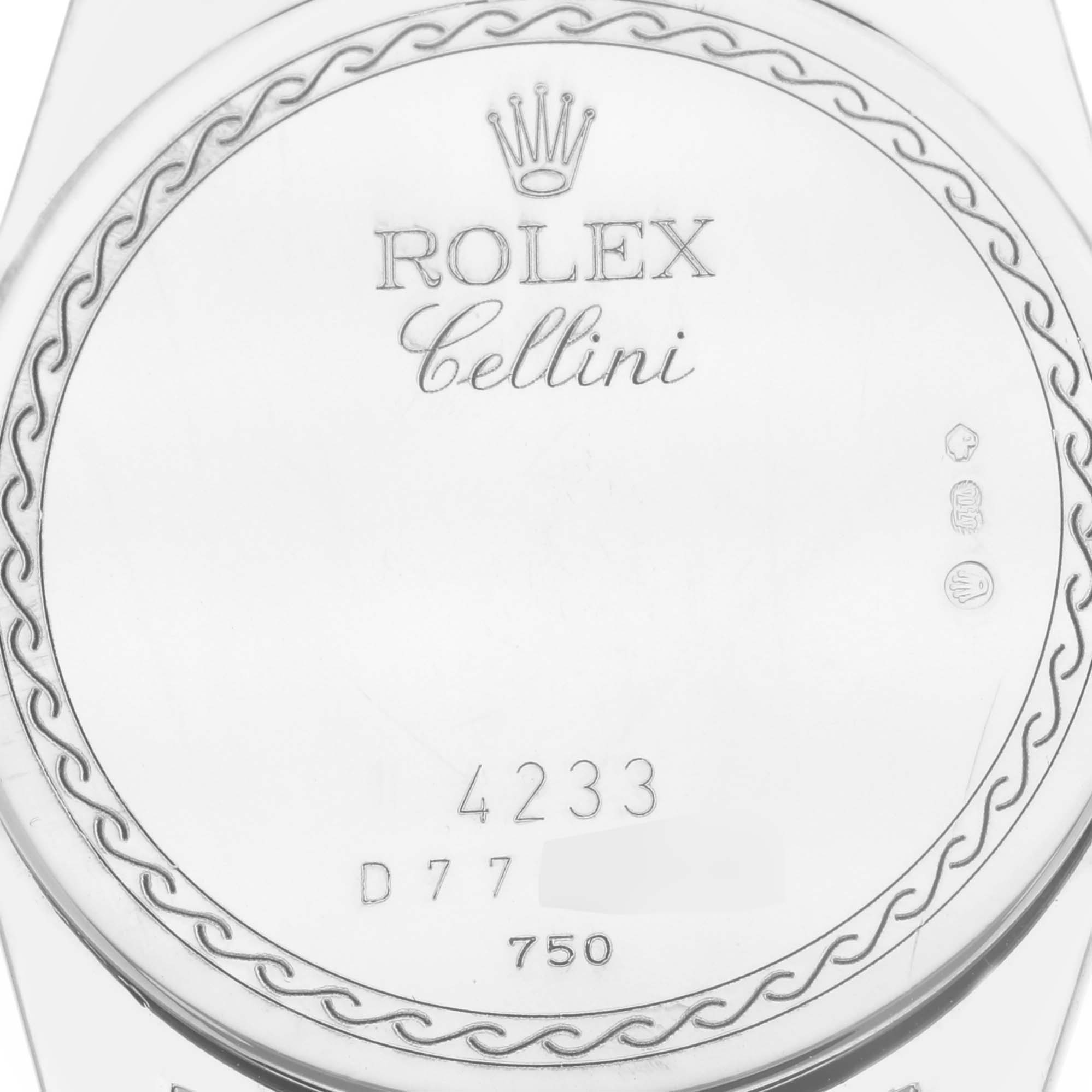 This image shows a close-up of the back case of a Rolex Cellini 4233/9 Men's White Gold White Dial 4233/9 Men's White Gold White Dial watch with visible engraving details.