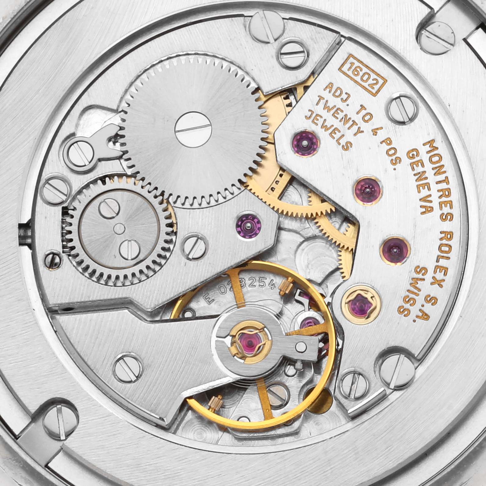 The image shows the intricate internal mechanics of a Rolex Cellini 4233/9 Men's White Gold White Dial 4233/9 Men's White Gold White Dial watch at a close-up angle.