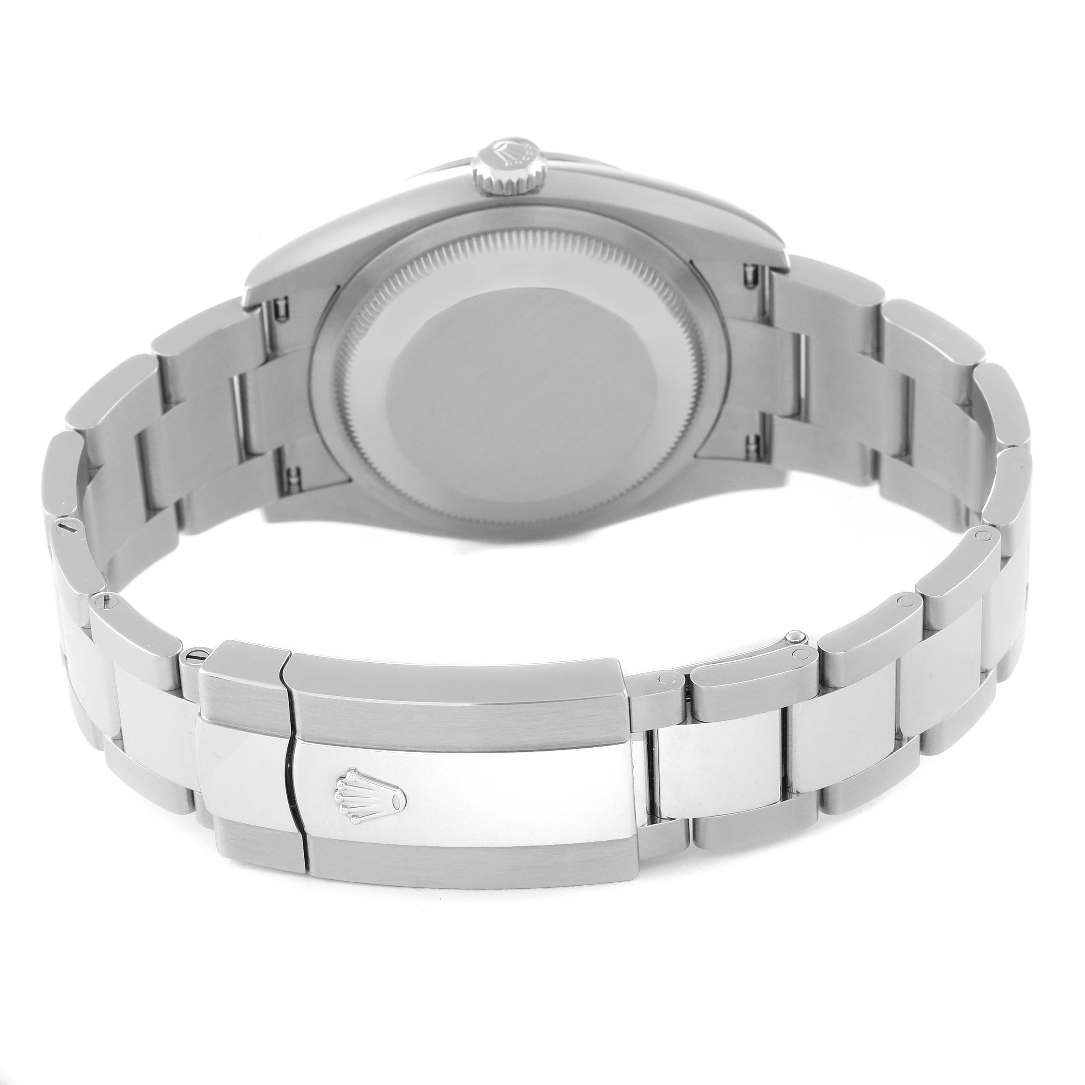 The image shows the back view of a Rolex Datejust 126200 Men's Stainless Steel Blue Dial 126200 Men's Stainless Steel Blue Dial watch, highlighting the closed clasp and the bracelet.