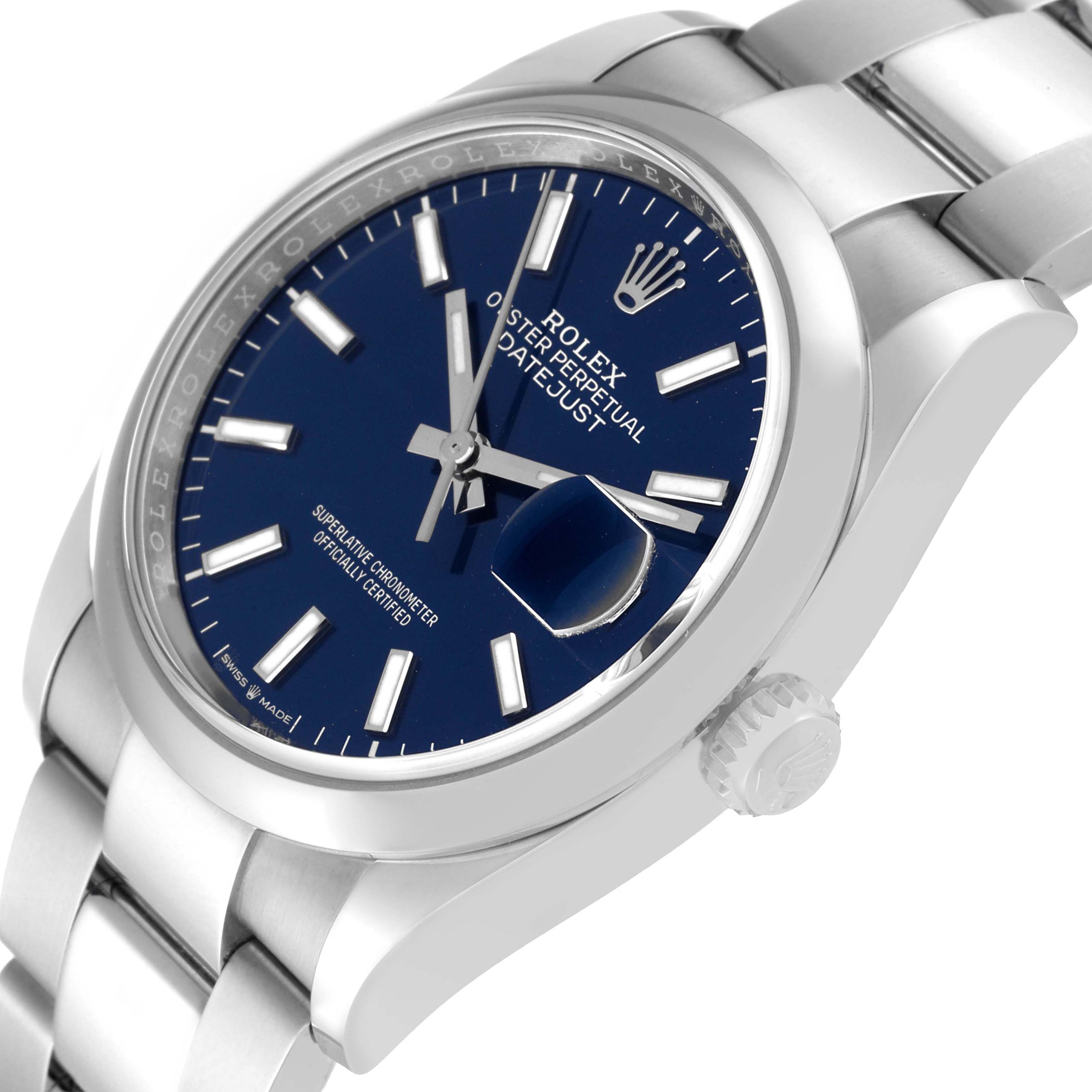 This image shows a close-up angle of a Rolex Datejust 126200 Men's Stainless Steel Blue Dial 126200 Men's Stainless Steel Blue Dial watch, highlighting the dial, date magnifier, and part of the bracelet.