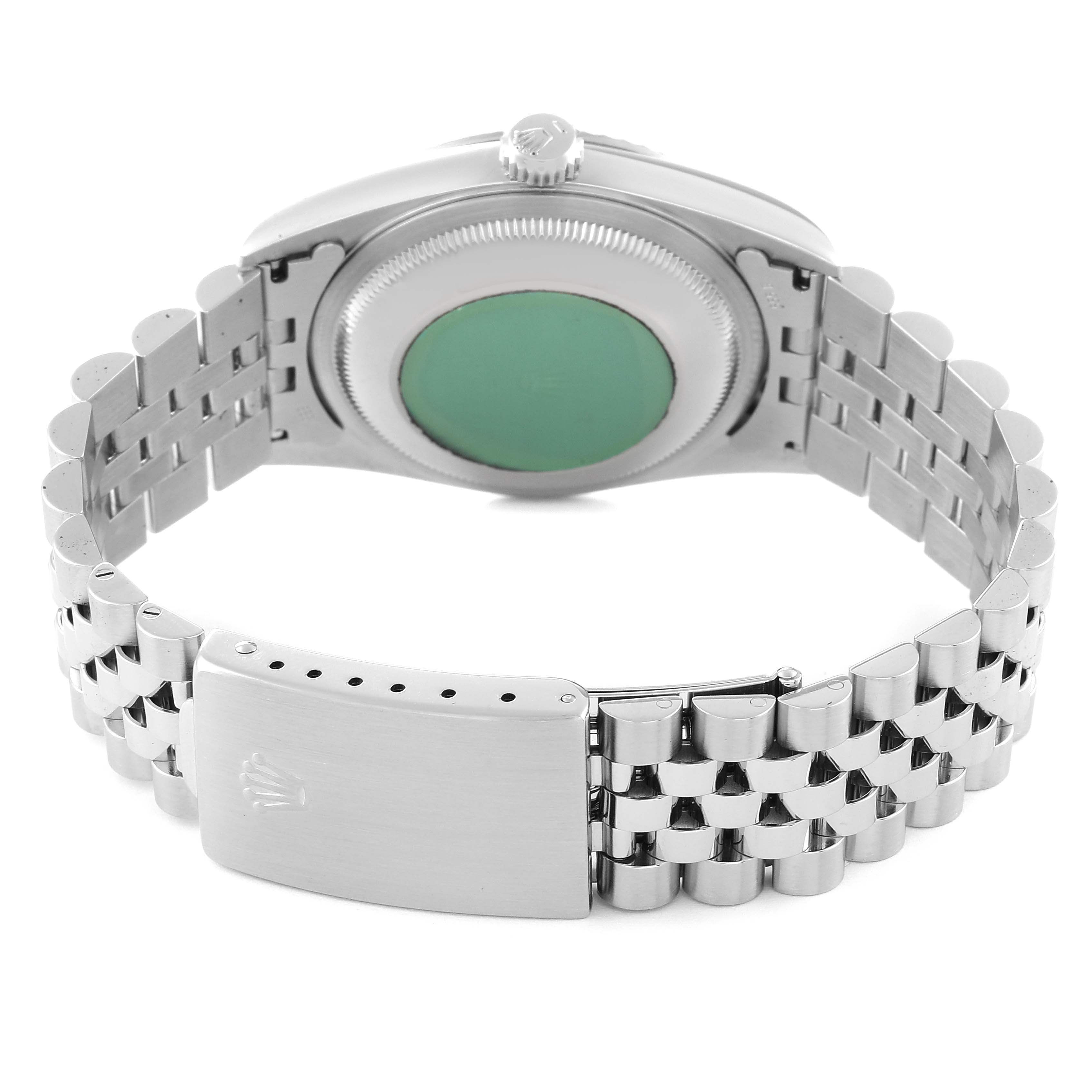 The image shows the back of a Rolex Datejust 16234 Men's Stainless Steel Pink Dial 16234 Men's Stainless Steel Pink Dial watch, highlighting its case back and metal bracelet with the clasp visible.