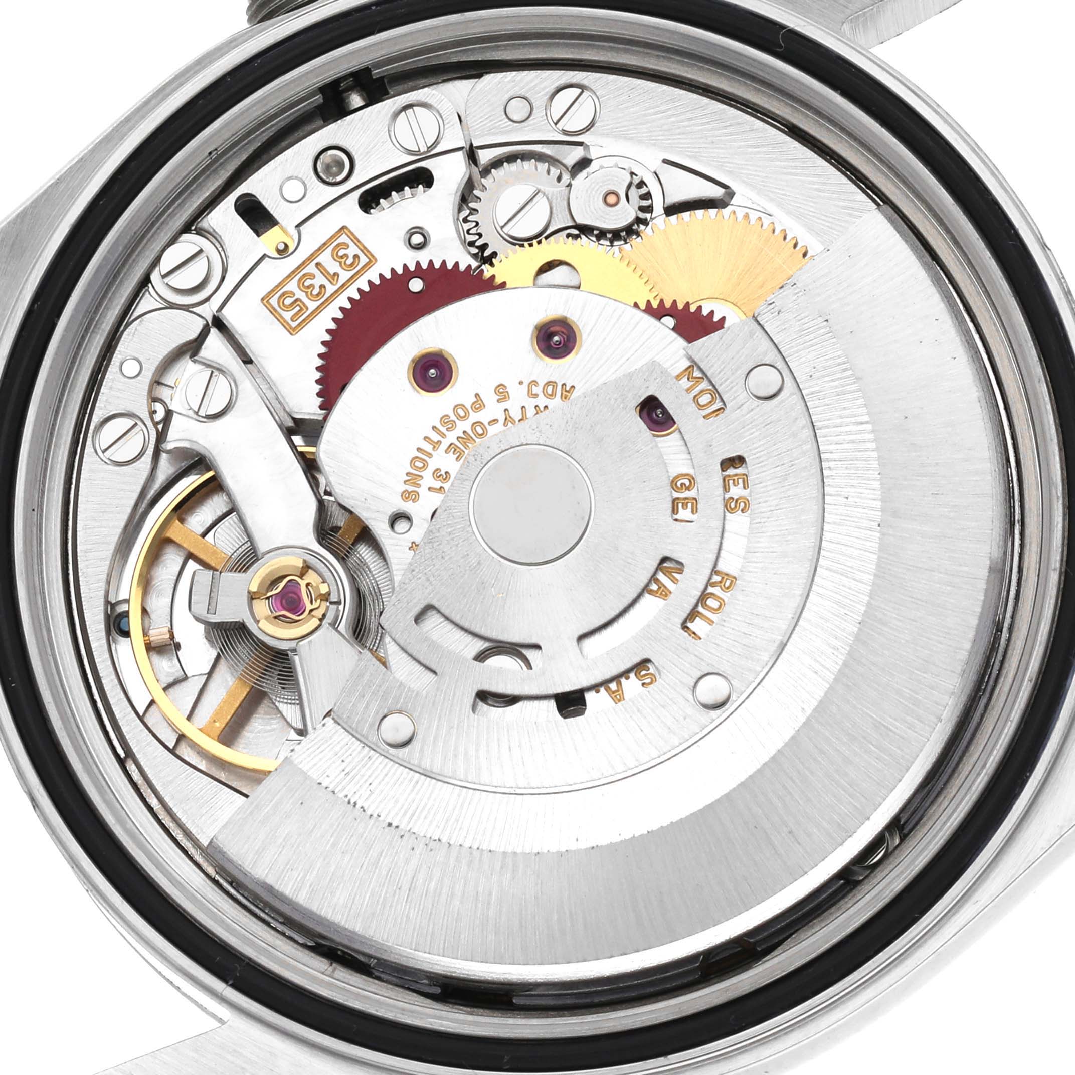 This close-up image shows the movement mechanism of the Rolex Datejust 16220 Men
s Stainless Steel White Dial 16220 Men
s Stainless Steel White Dial watch, highlighting gears, rotor, and components.