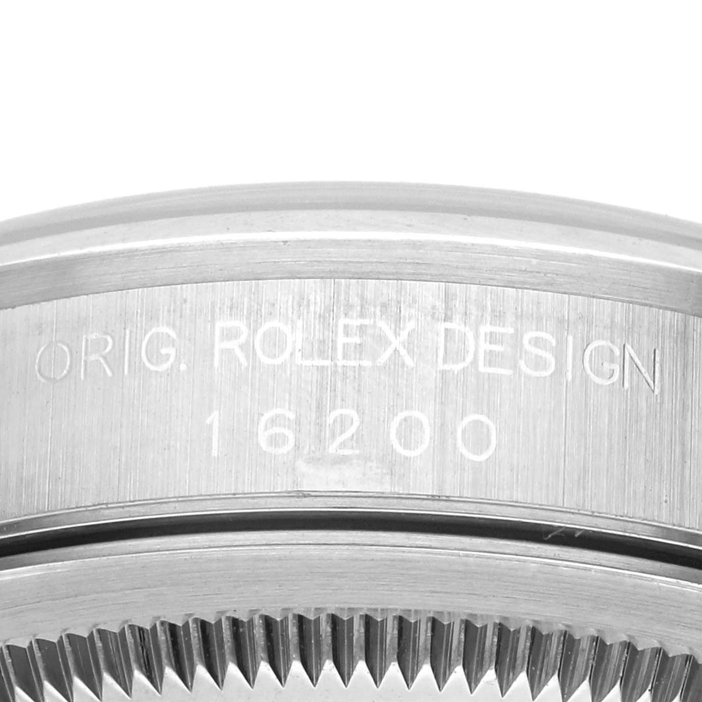 This image shows the side engraving and part of the bezel of the Rolex Datejust 16200 Men
s Stainless Steel Black Dial 16200 Men
s Stainless Steel Black Dial model, displaying the model number 16200.
