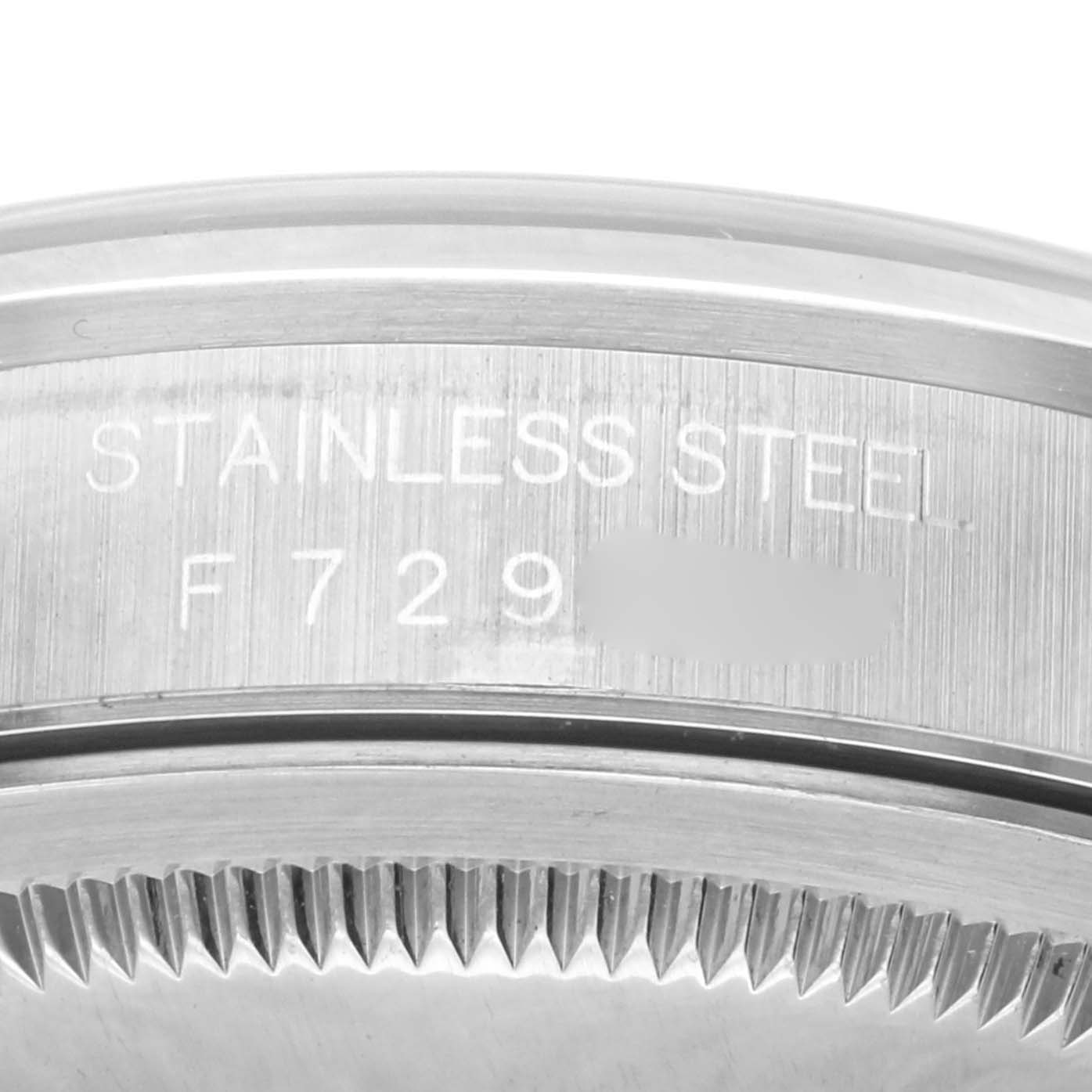 This close-up image shows the stainless steel case and part of the fluted bezel of a Rolex Datejust 16200 Men
s Stainless Steel Black Dial 16200 Men
s Stainless Steel Black Dial watch.