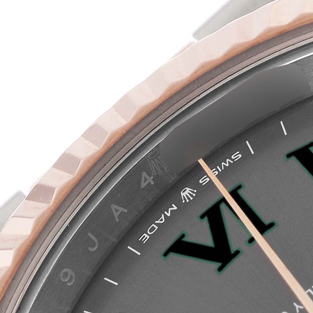 The image shows a close-up of the bezel and dial of a Rolex Datejust 41 126331 Men's Steel and Gold (two tone) Grey Dial 126331 Men's Steel and Gold (two tone) Grey Dial watch, including the "SWISS MADE" text and the number 4 indicator.