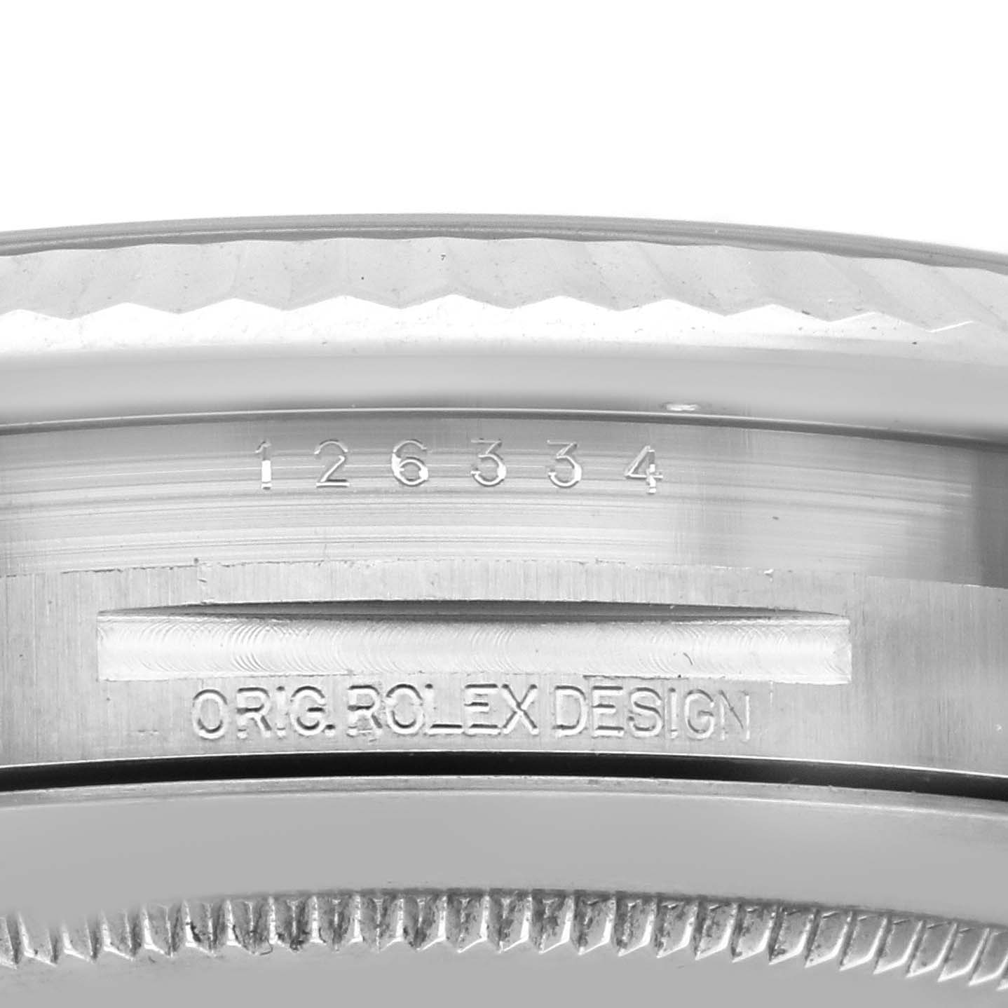 This is a close-up of the Rolex Datejust 41 126334 Men
s Stainless Steel Blue Dial 126334 Men
s Stainless Steel Blue Dial model showing the serial number engraving and "ORIG. ROLEX DESIGN" inscription on the side.