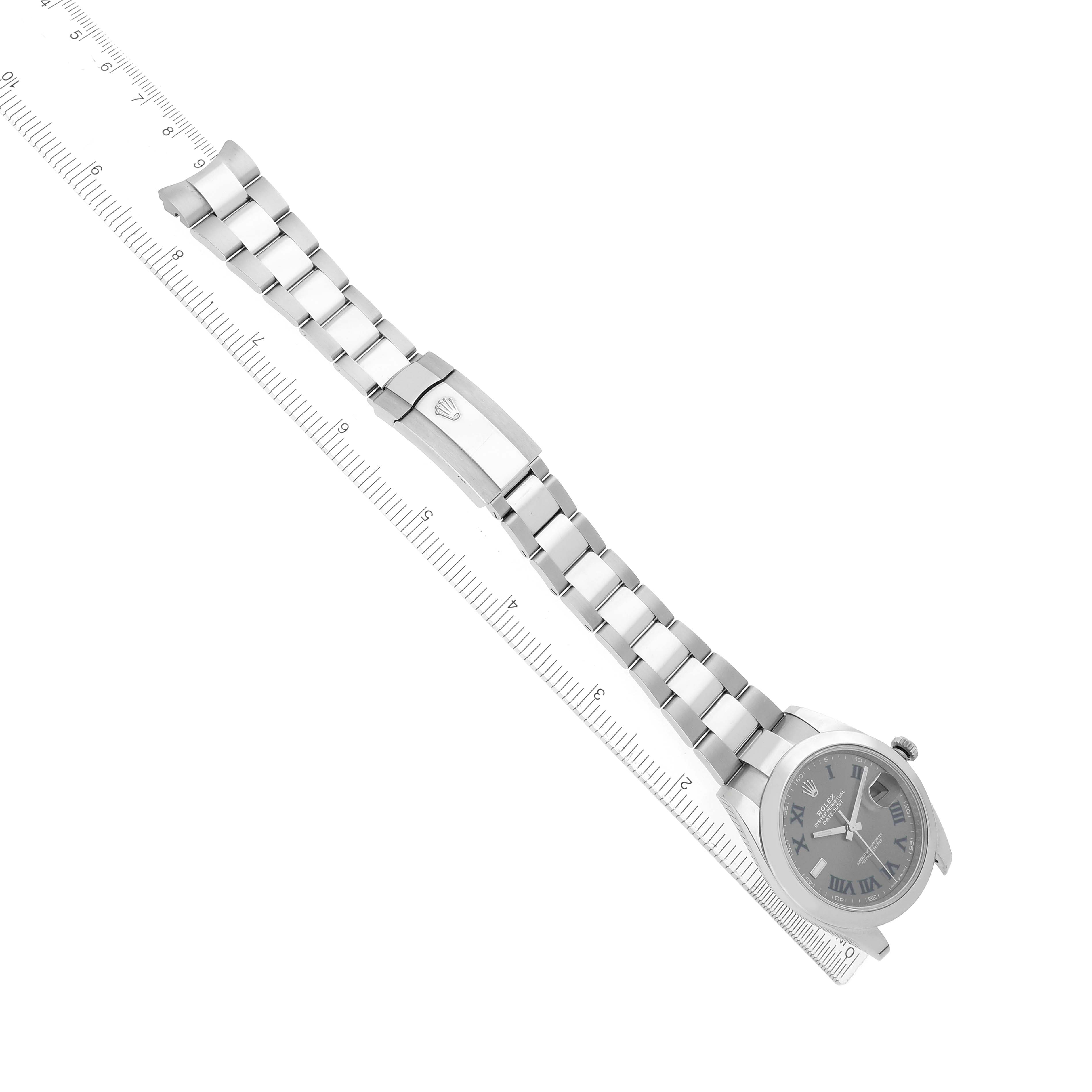 The Rolex Datejust 41 126300 Men
s Stainless Steel Grey Dial watch is shown from a top view, highlighting the face, bezel, and entire bracelet alongside a ruler.
