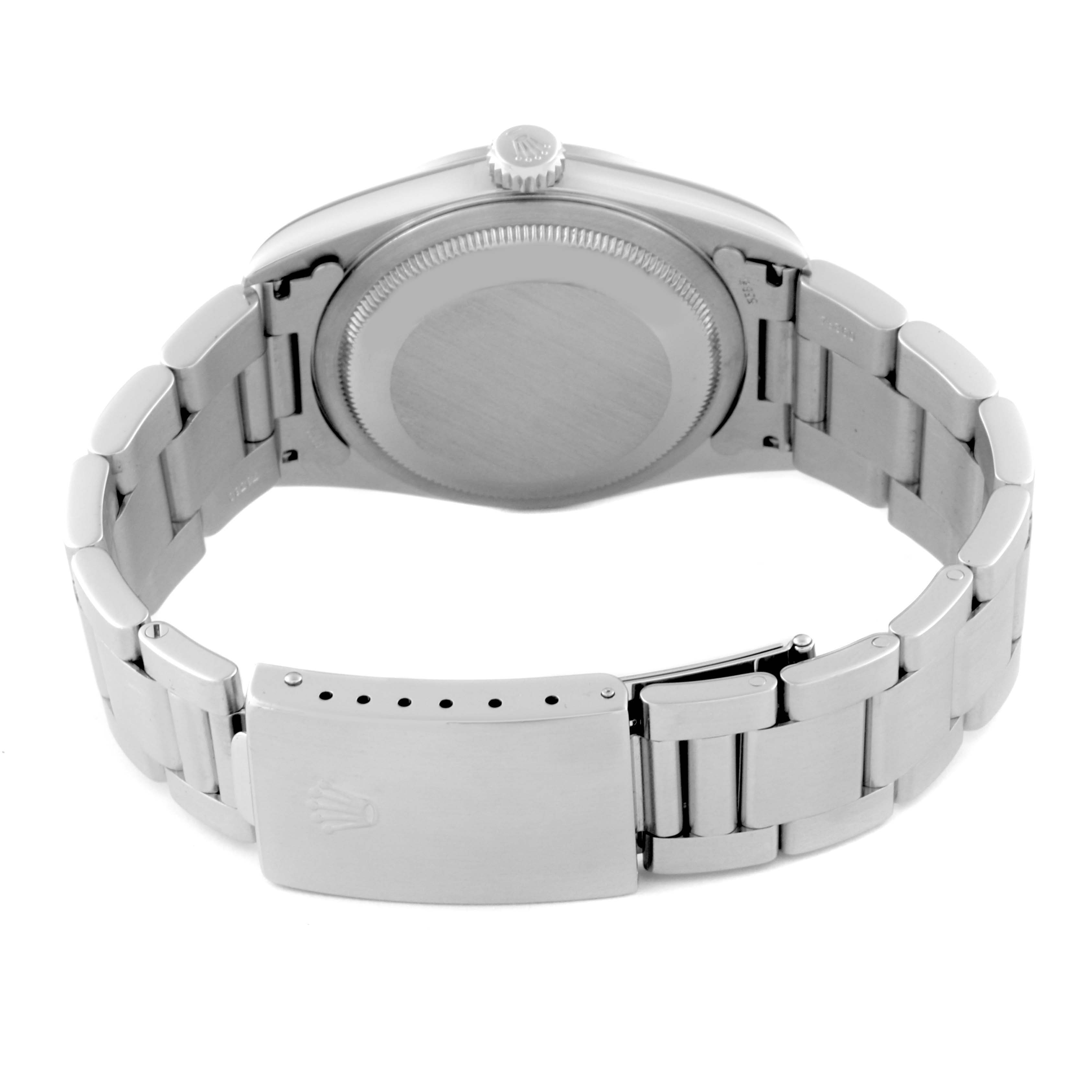 This image shows the back case and bracelet clasp of a Rolex Datejust 16200 Men's Stainless Steel Blue Dial 16200 Men's Stainless Steel Blue Dial watch.