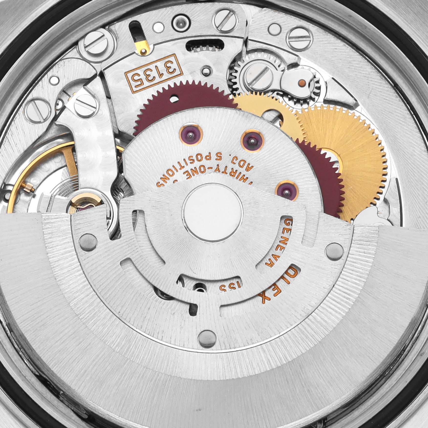 The image shows a close-up view of the internal mechanical movement of a Rolex Datejust 16200 Men's Stainless Steel Blue Dial 16200 Men's Stainless Steel Blue Dial watch, highlighting gears and components.