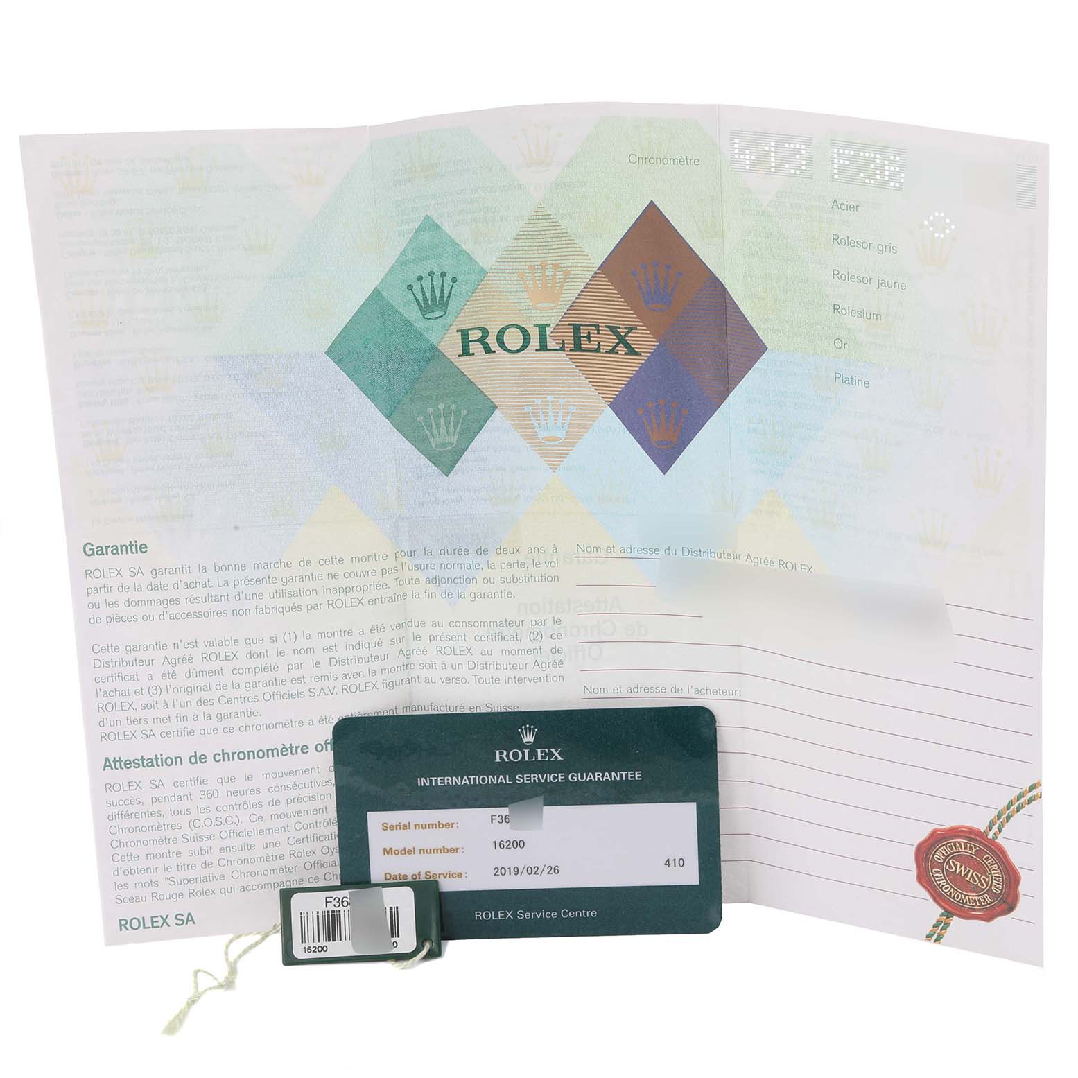 The image shows the authenticity and service documents along with tags for the Rolex Datejust 16200 Men's Stainless Steel Blue Dial 16200 Men's Stainless Steel Blue Dial model watch.