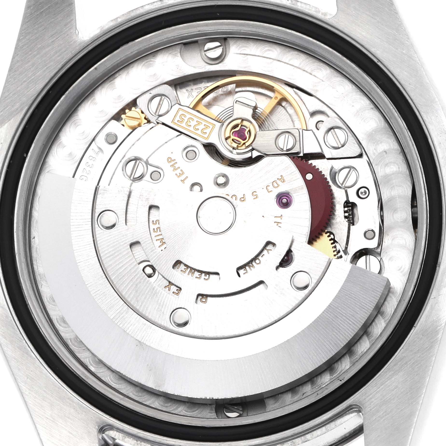 The image shows the movement of the Rolex Datejust 178274 Women
s Stainless Steel Silver Dial from a back angle, displaying the rotor and internal mechanical components.