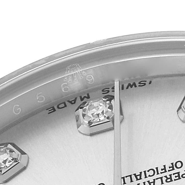 The close-up shows the dial and bezel of a Rolex Datejust 178274 Women
s Stainless Steel Silver Dial, highlighting diamond hour markers and "Swiss Made" text.