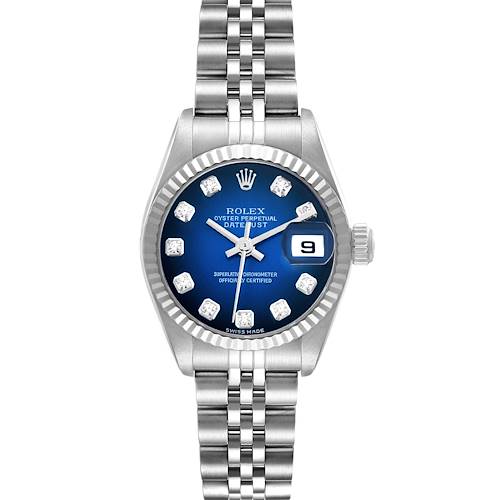 This Rolex Datejust watch is shown from a top-down angle, highlighting its blue dial, diamond markers, fluted bezel, and Jubilee bracelet.