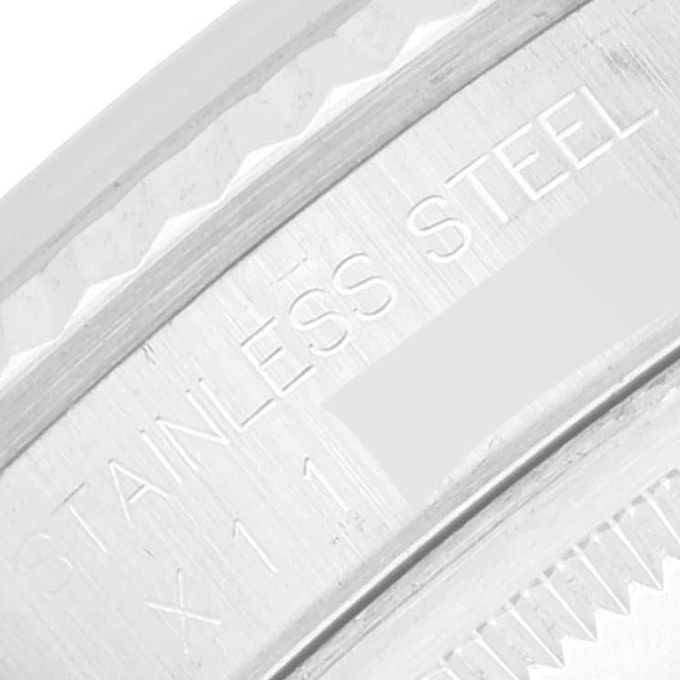 This is a close-up view of the case back of a Rolex Datejust 16234 Men's Stainless Steel Silver Dial 16234 Men's Stainless Steel Silver Dial watch, featuring the "STAINLESS STEEL" engraving.