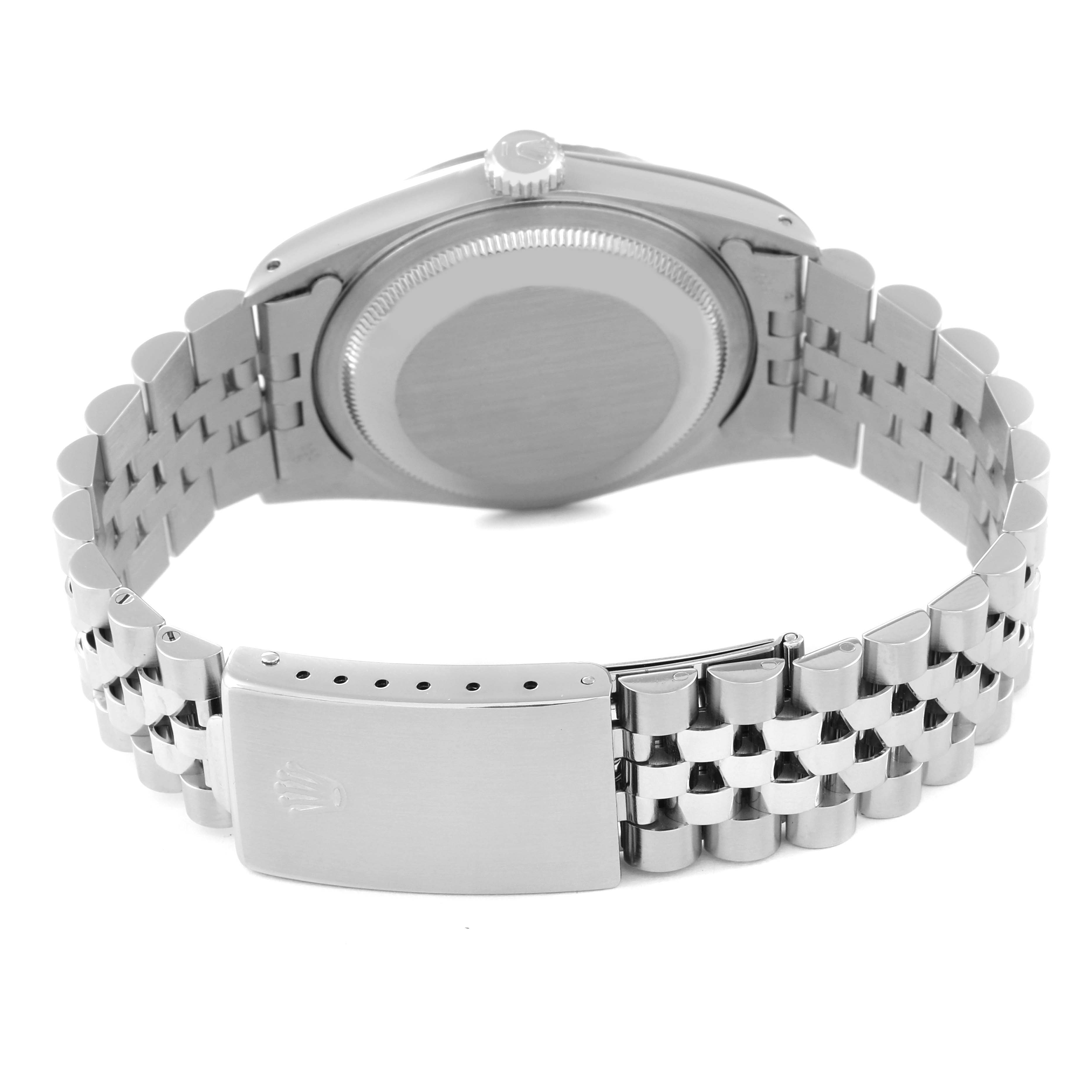 This image shows the backside of a Rolex Datejust 16234 Men's Stainless Steel Silver Dial 16234 Men's Stainless Steel Silver Dial watch, highlighting the bracelet and the clasp.