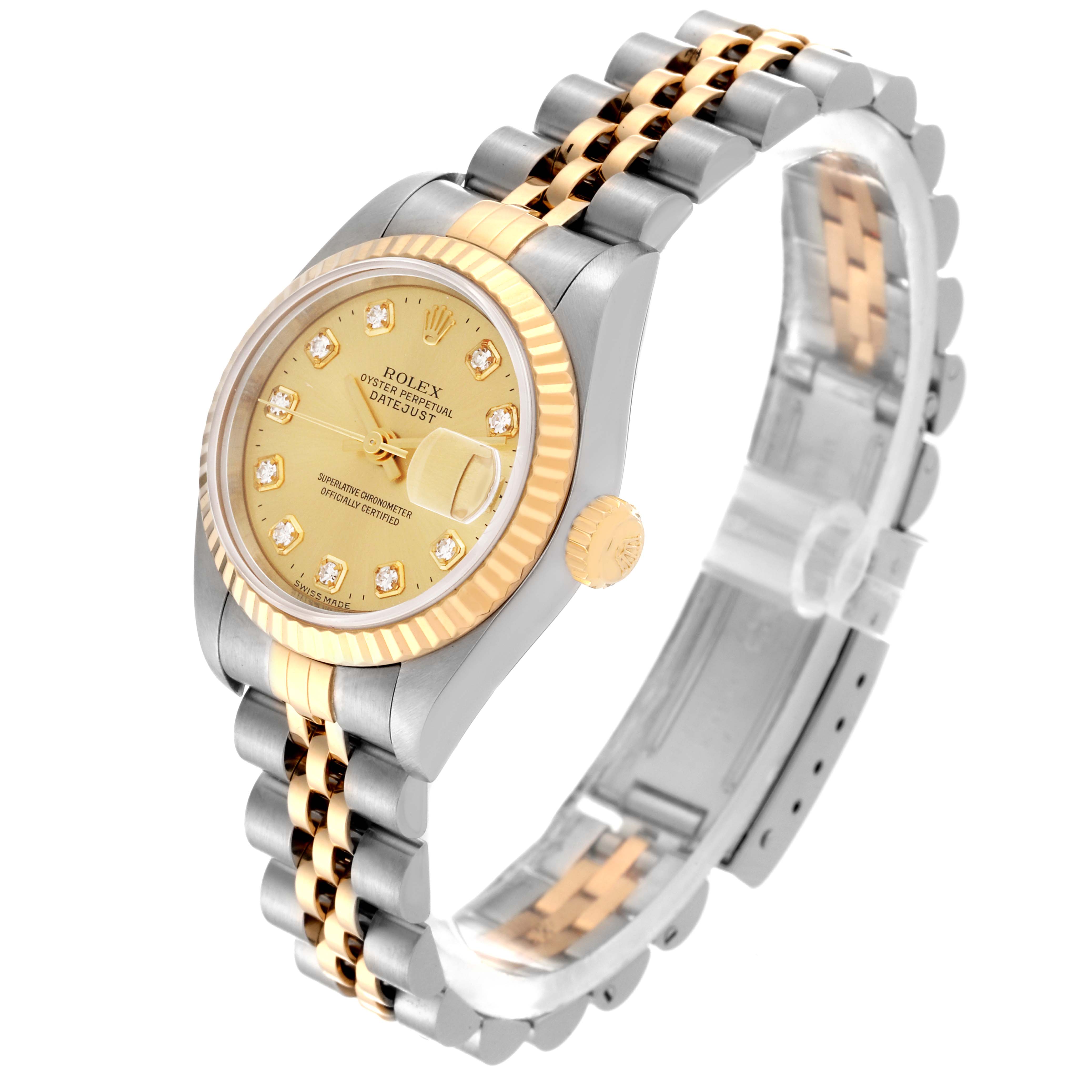The image shows a three-quarter view of the Rolex Datejust 79173 Women
s Steel and Gold (two tone) Champagne Dial 79173 Women
s Steel and Gold (two tone) Champagne Dial watch, highlighting its gold dial, fluted bezel, and two-tone bracelet.