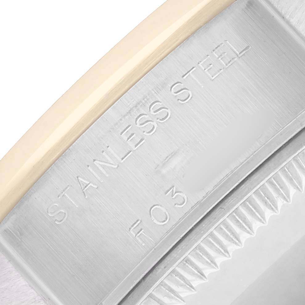 The image shows a close-up of the stainless steel case back of a Rolex Datejust 79163 Women
s Steel and Gold (two tone) Champagne Dial watch.