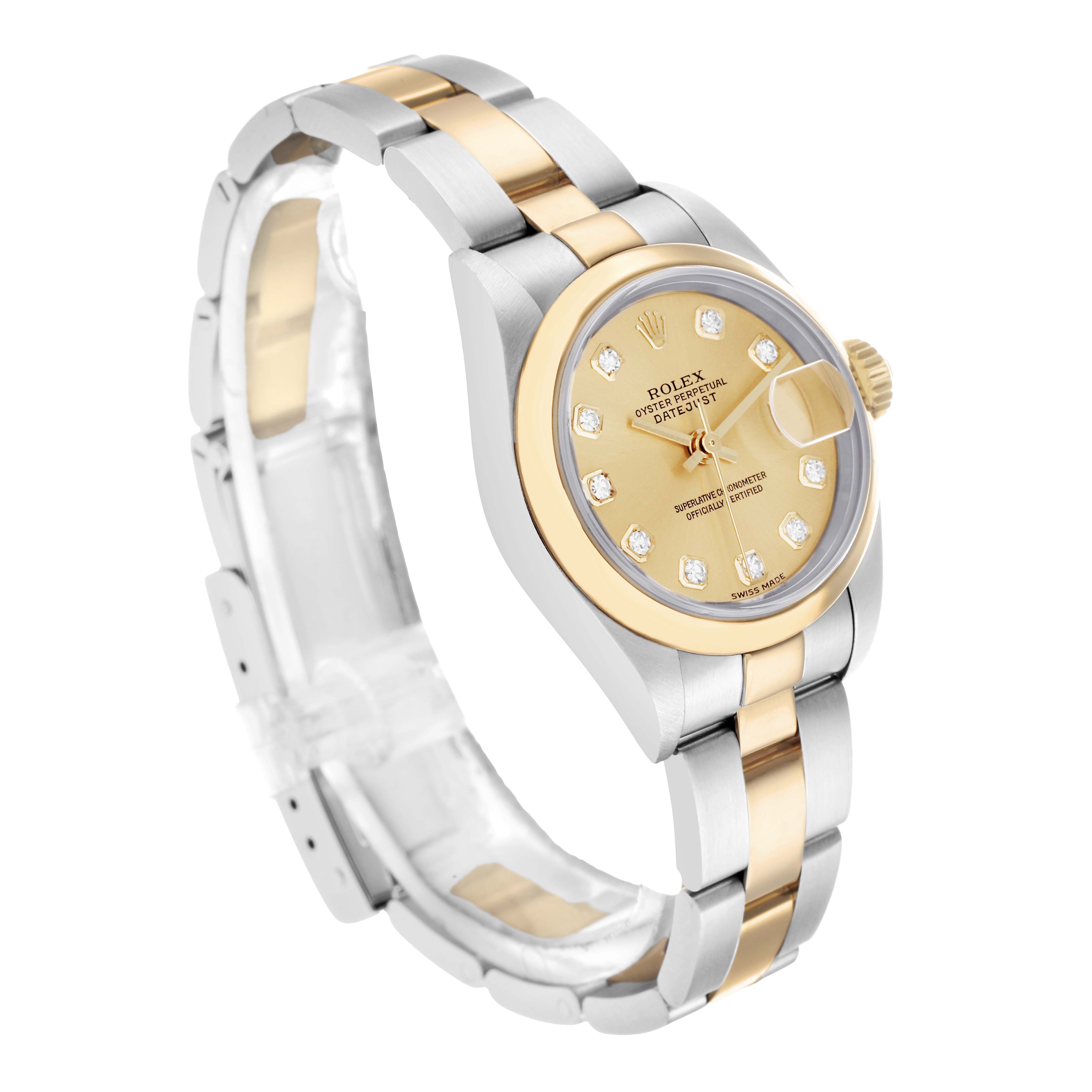 The Rolex Datejust 79163 Women
s Steel and Gold (two tone) Champagne Dial watch is at a three-quarter angle, showing the bracelet, bezel, and diamond-set dial.