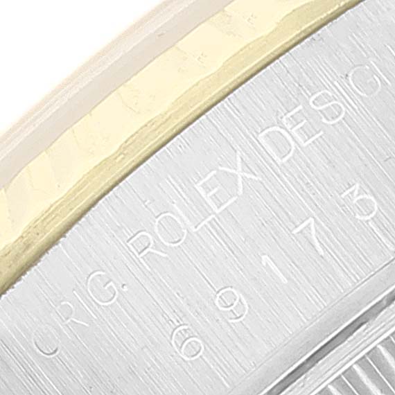 This image shows a close-up angle of the case side of a Rolex Datejust 69173 Women's Steel and Gold (two tone) Grey Dial 69173 Women's Steel and Gold (two tone) Grey Dial watch, highlighting the brand engraving.